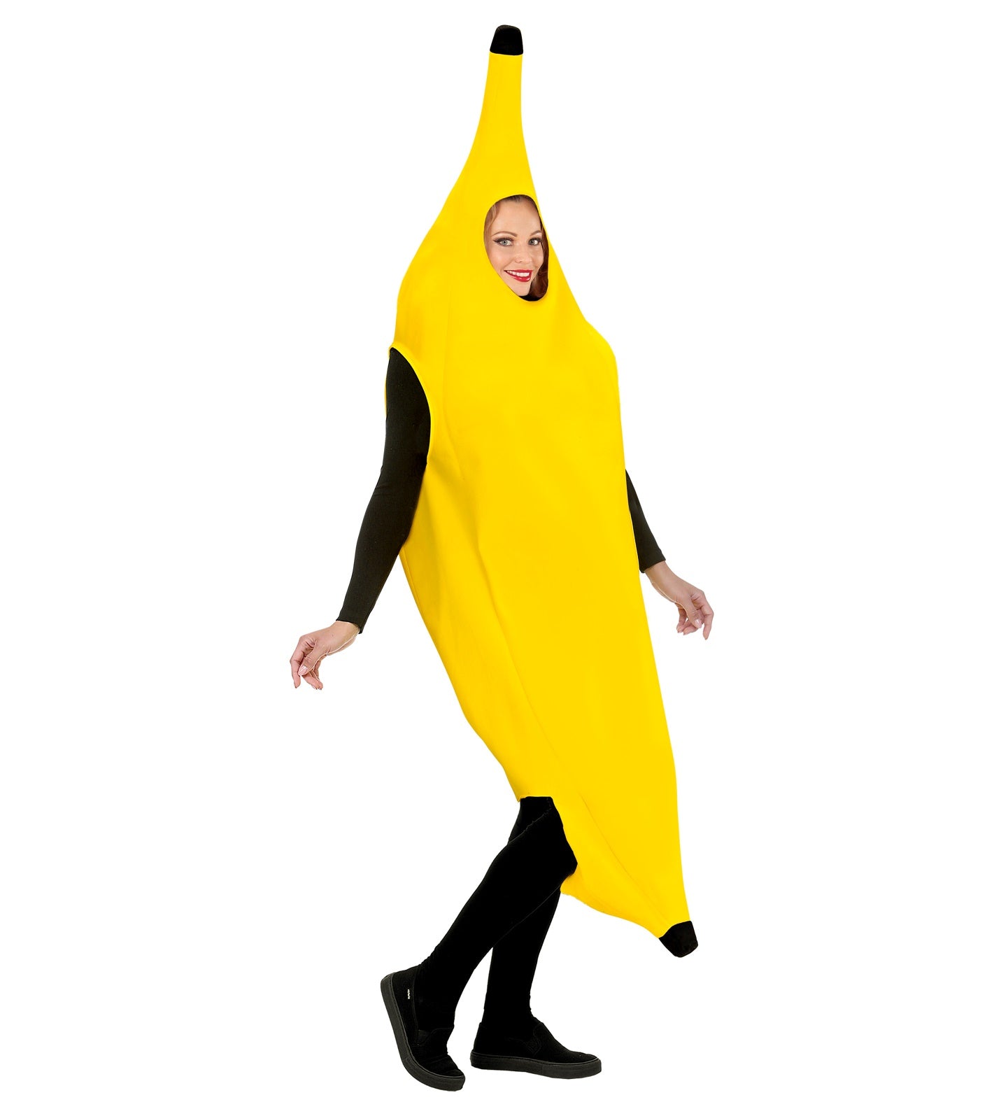 A woman smiling playfully while wearing a bright yellow, one-piece adult banana fancy dress costume with a face cutout, styled over a black long-sleeve top and black leggings.