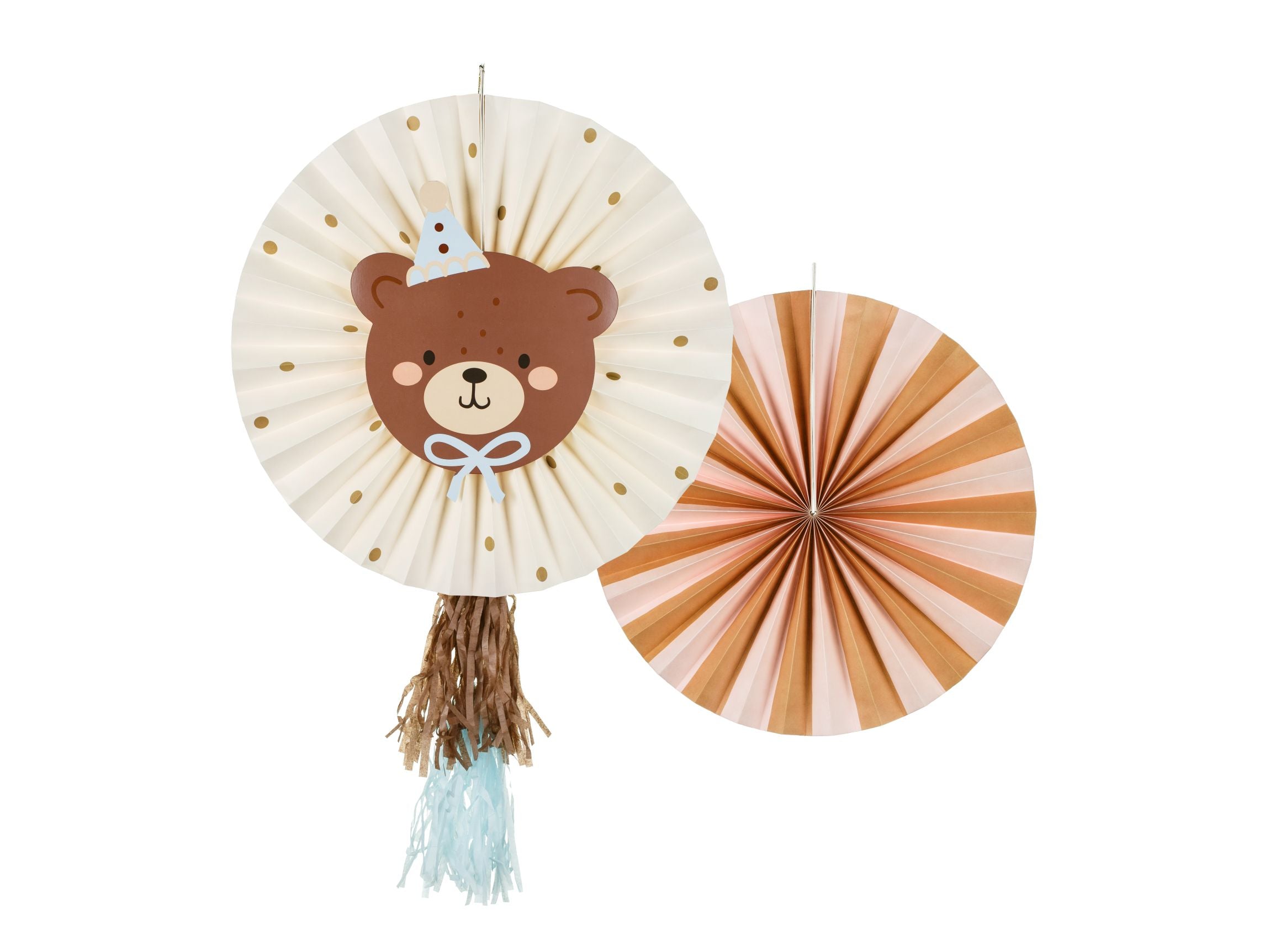A set of two decorative paper rosettes for a teddy bear theme party; one large cream-colored rosette with gold polka dots featuring a brown teddy bear face with a blue party hat and brown and light blue tassels, and a smaller orange and light brown striped rosette.