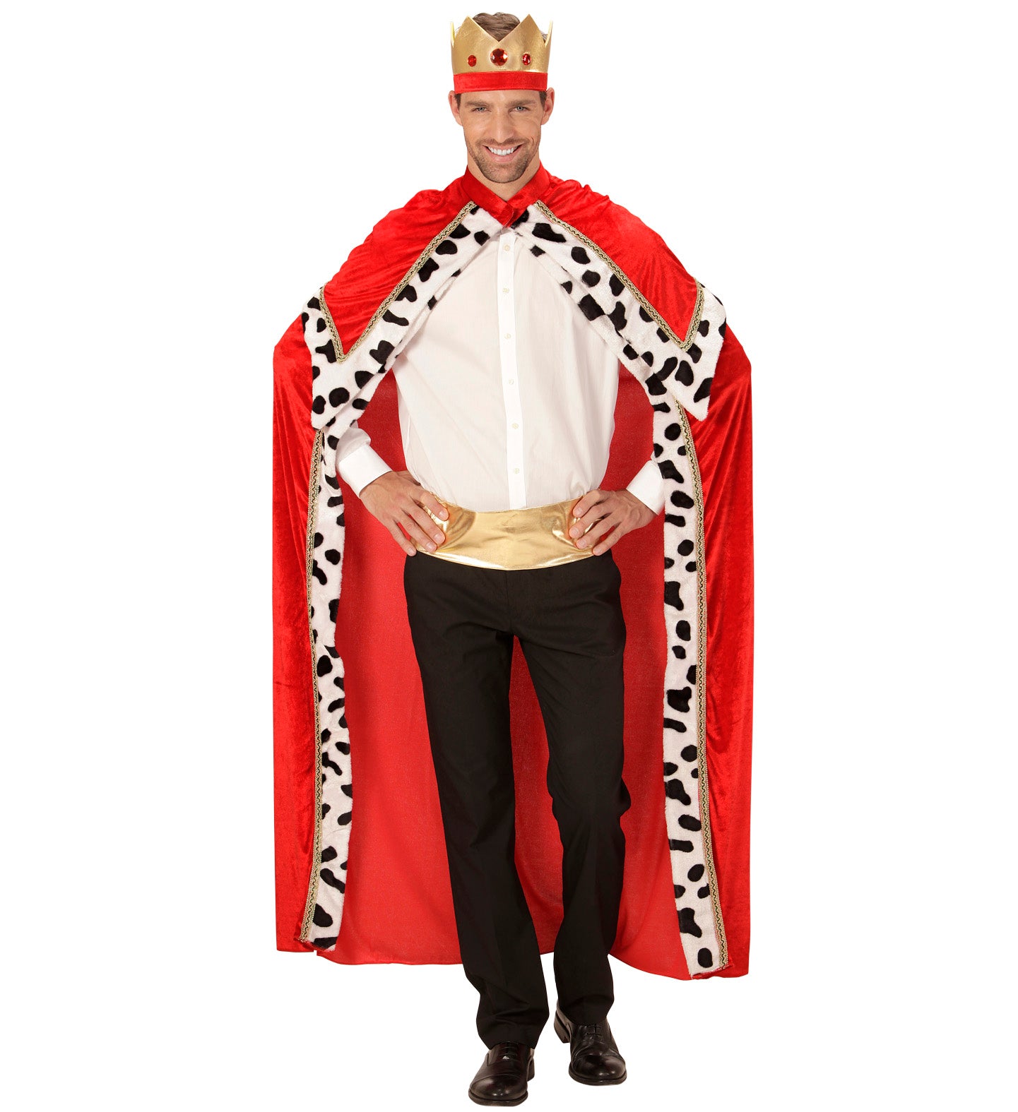 A smiling man models a red velvet king's cape with faux fur trim and a gold crown, worn over a white shirt and black trousers.