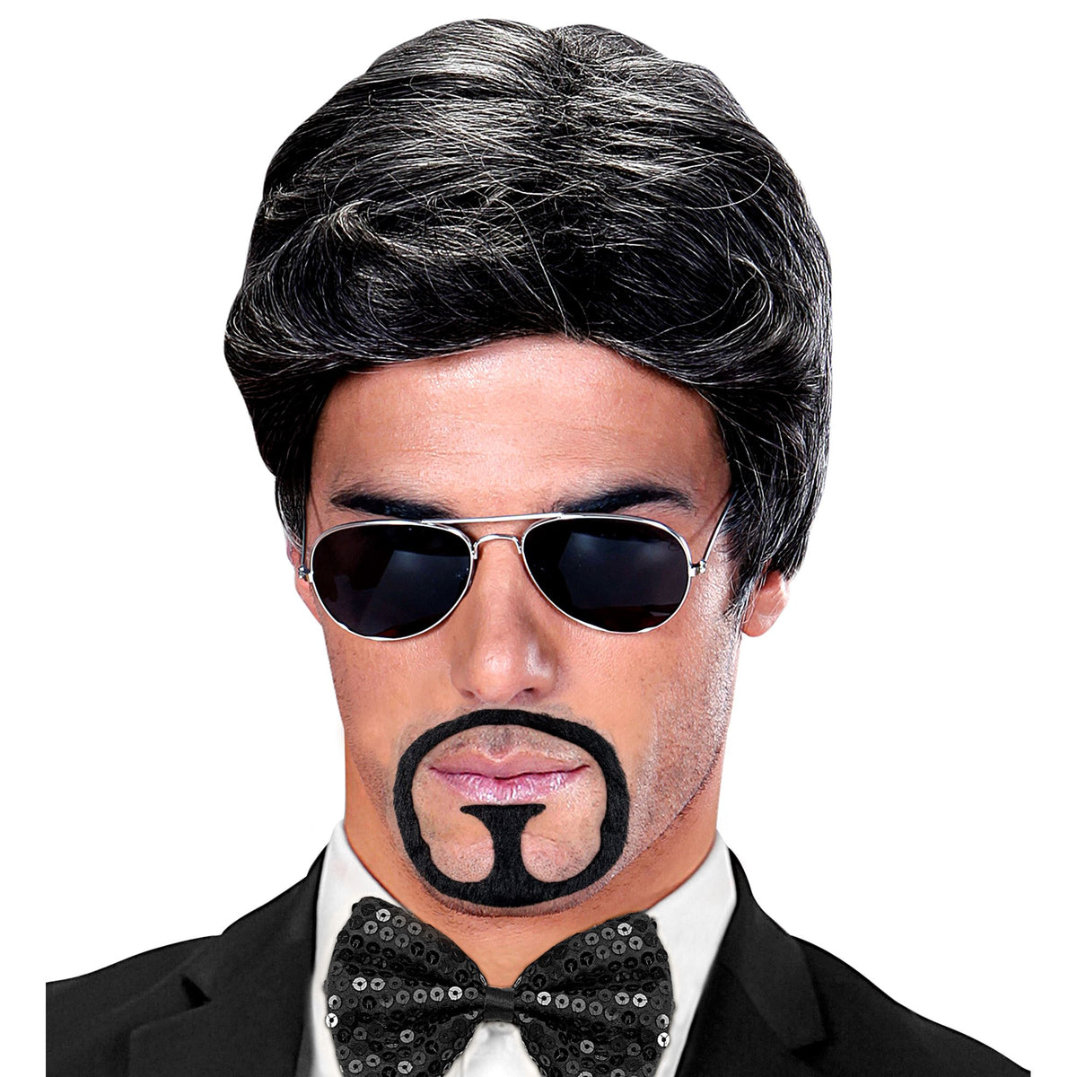 A man wearing a black suit, sparkly bow tie, and aviator sunglasses, modeling a black stick-on goatee beard featuring a circular design.