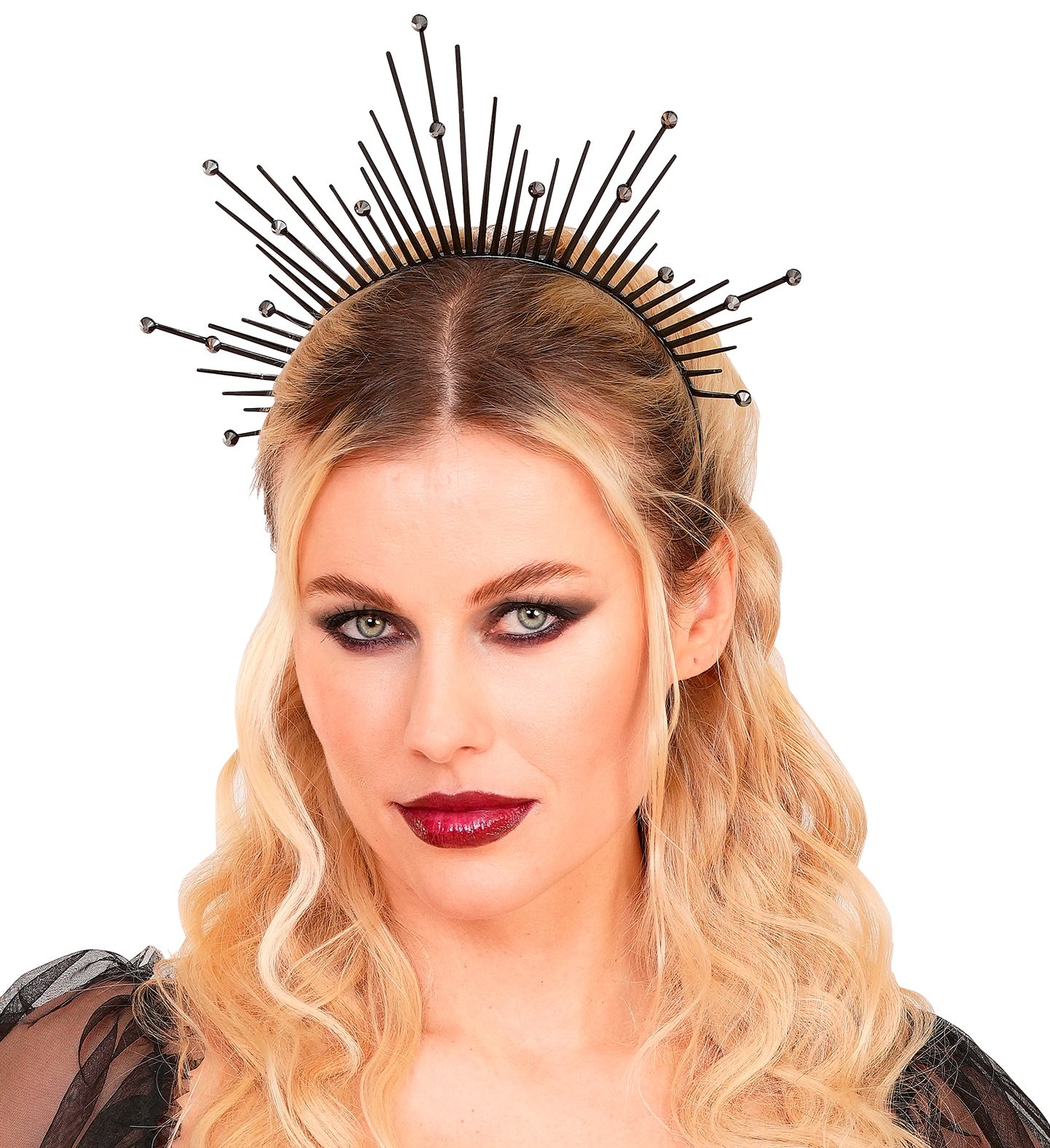 A close-up of a woman with smoky eye makeup and red lipstick wearing the black spiky halo headband.