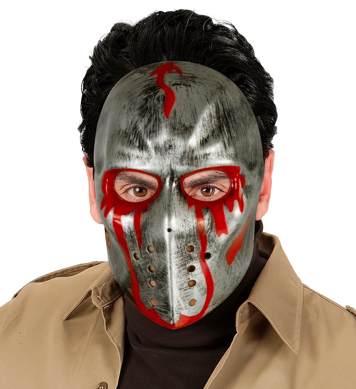 A man wearing the silver and red bloody hockey mask as a scary Halloween costume accessory.