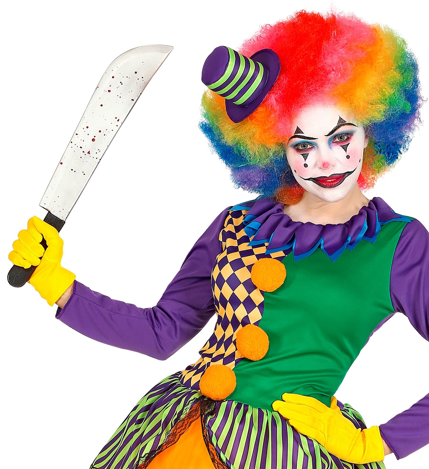 A person in a colourful killer clown costume smiling while holding the bloody machete prop.
