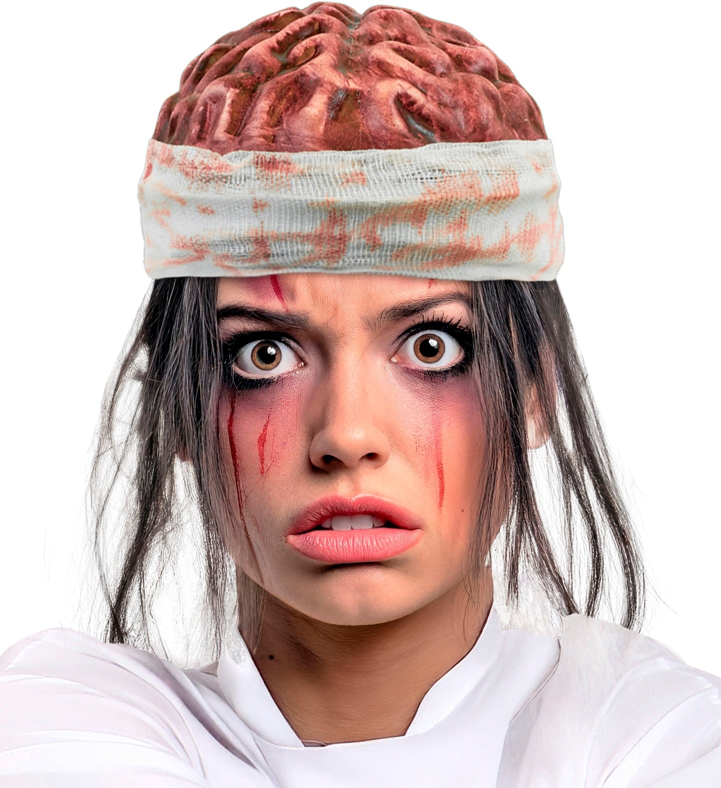 A close-up portrait of a female model with dark smudged makeup and fake blood running down her face, looking terrified while wearing a realistic exposed brain headpiece with a bloody bandage base.