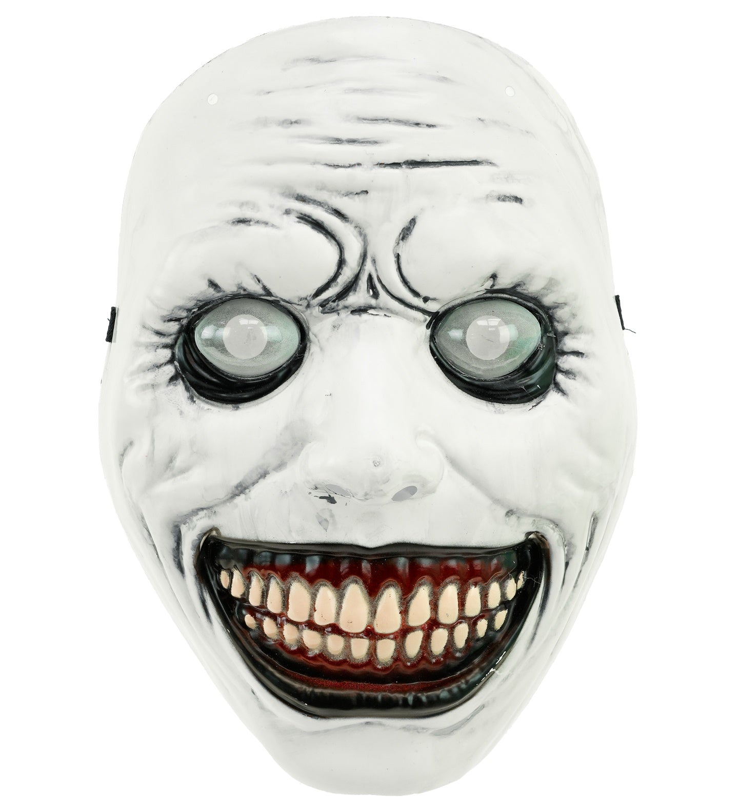 A straight-on flat lay view of a pale white creepy monster fancy dress mask, featuring bulging cloudy plastic dome eyes, heavy dark wrinkles, and a massive, sinister smile with exposed teeth.