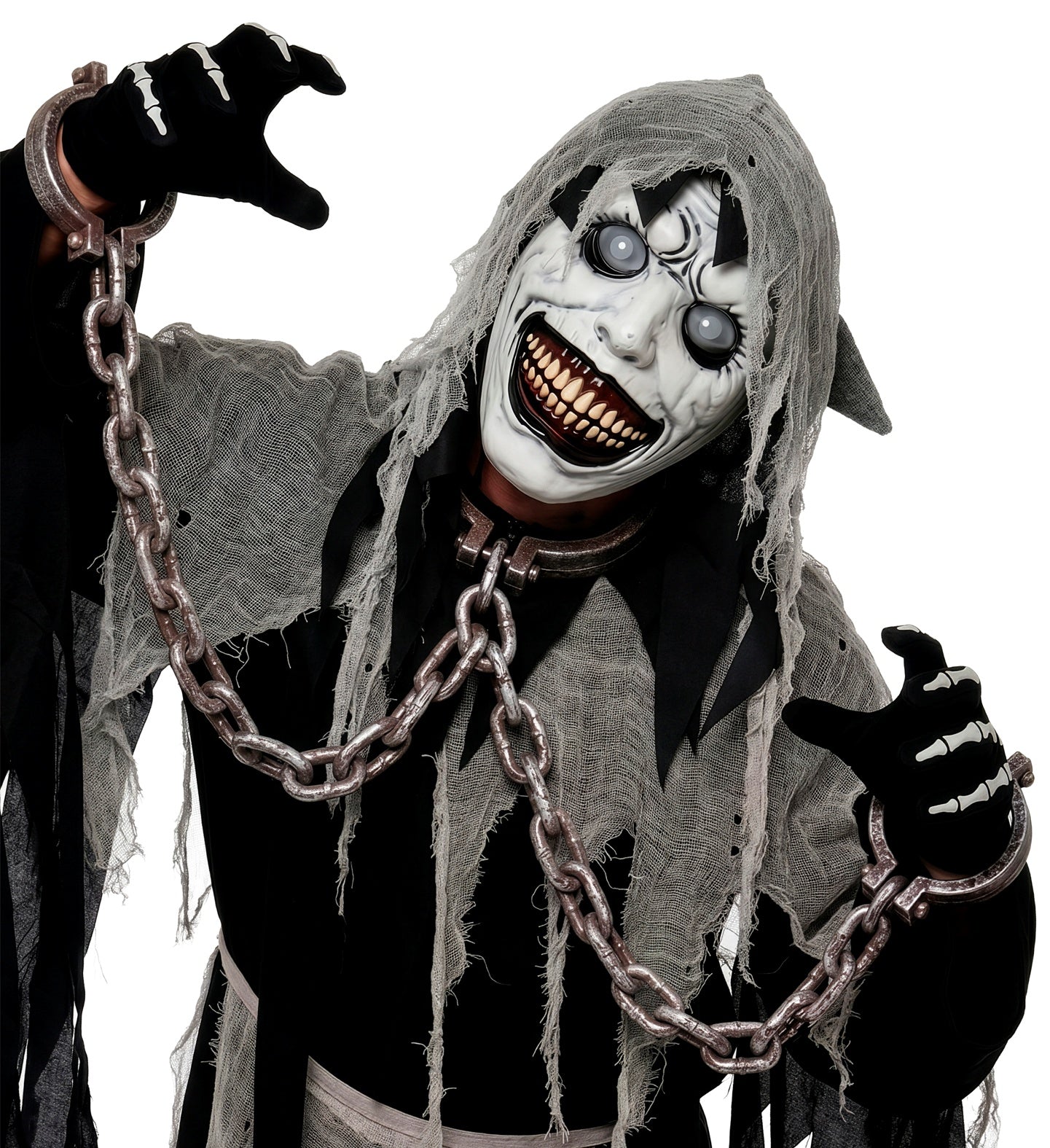 A model wearing a pale white creepy monster mask with cloudy bulging eyes, draped in tattered grey cheesecloth and wearing fake metal chains and wrist shackles.