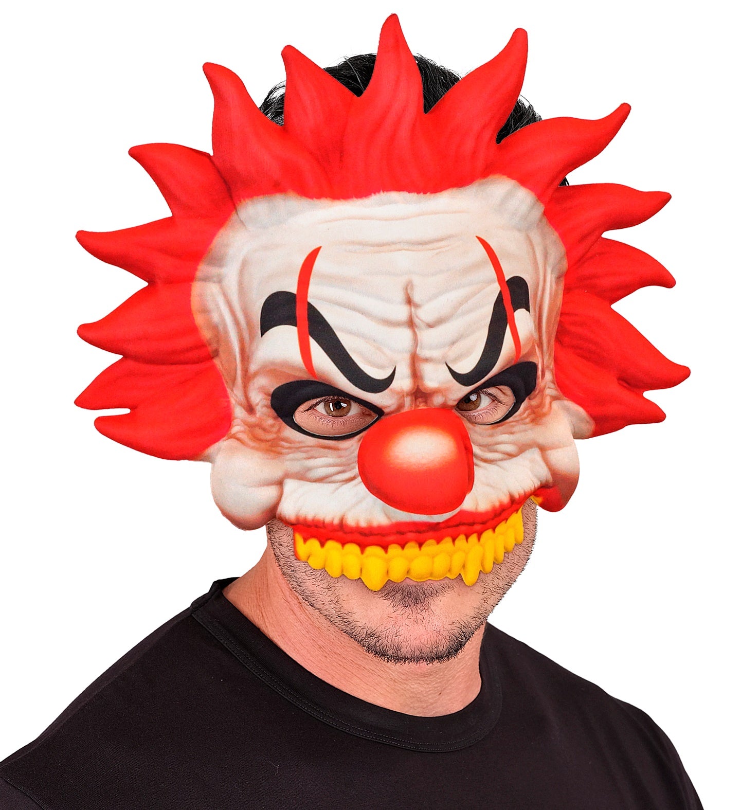 A man wearing a chinless killer clown mask, showing how it leaves his own chin and mouth exposed.