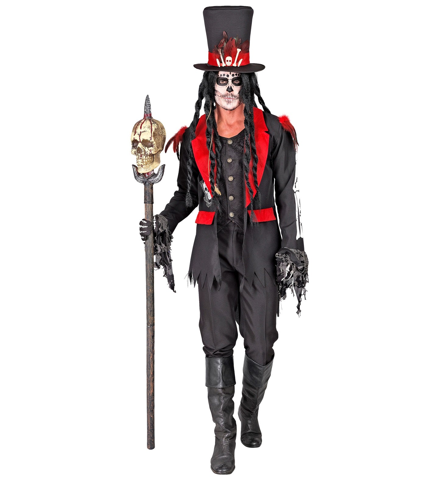A person in a full Voodoo-themed Dia De Los Muertos costume, walking forward with a tall staff topped with a white skull. The person is wearing a long jacket with a red lapel, a top hat, and has skeleton-themed face paint.