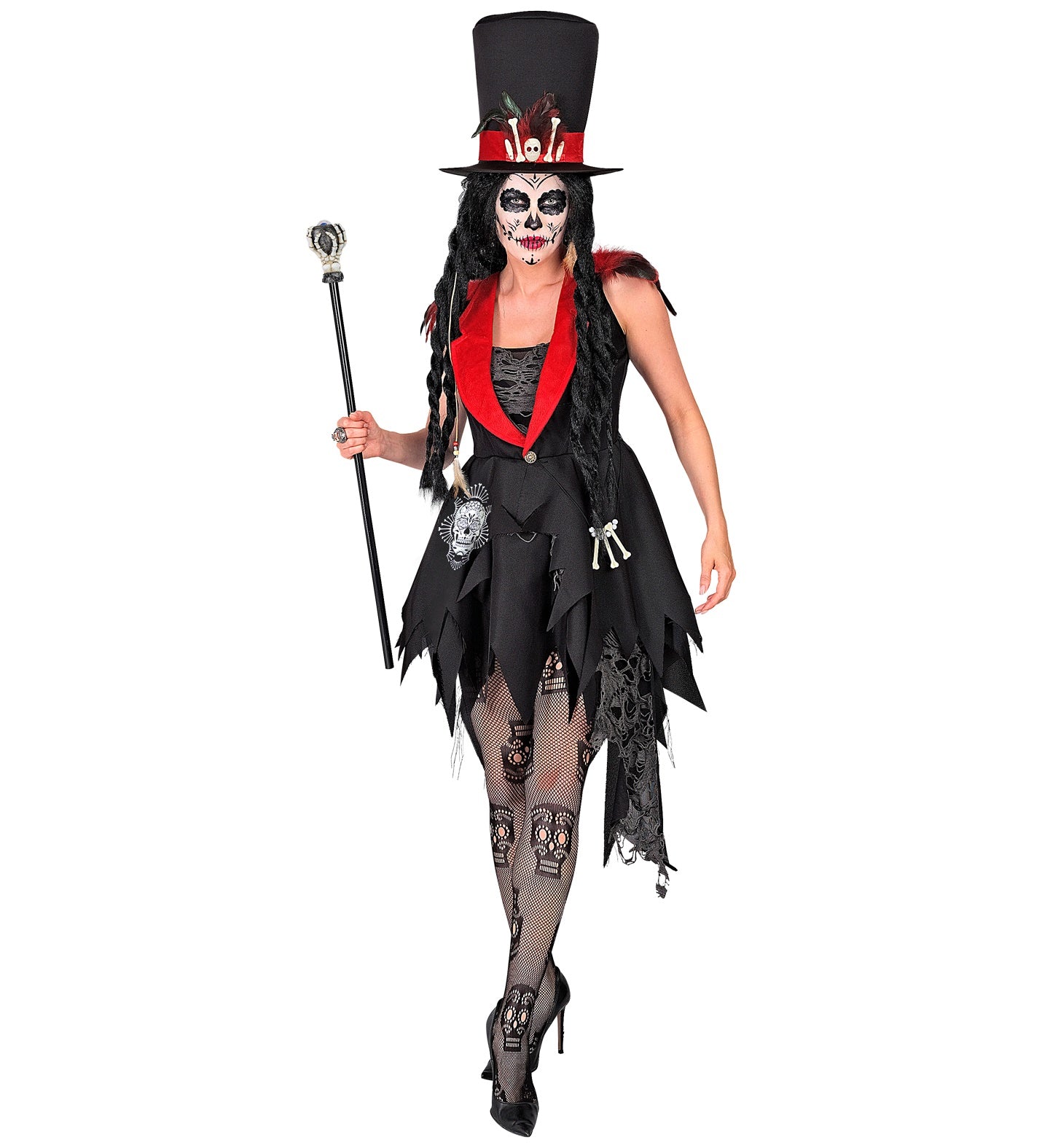 A woman in a full Voodoo-themed Dia De Los Muertos costume, with one hand on their hat and the other holding a cane. The costume includes a dress with a red lapel, a top hat, and skeleton-themed fishnet tights.