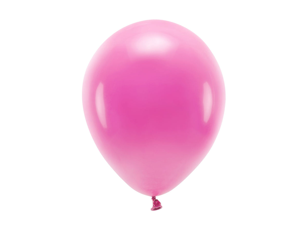 A single fully inflated pastel fuchsia pink latex party balloon floating against a stark white background.
