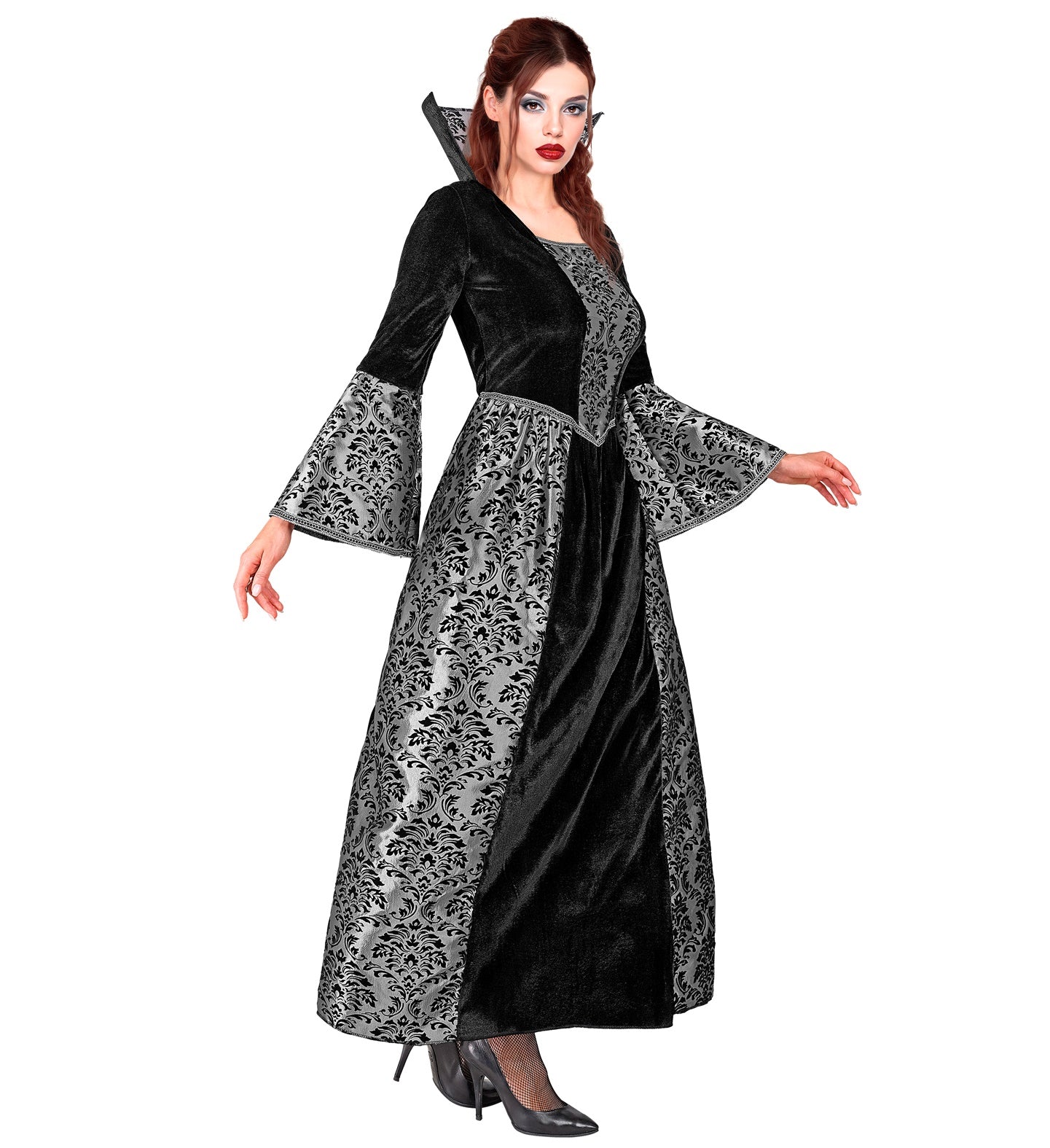 A side view of a lady in an elegant vampire costume, showing the full-length black velvet gown with a dramatic collar and silver damask patterned panels on the skirt and bell sleeves.