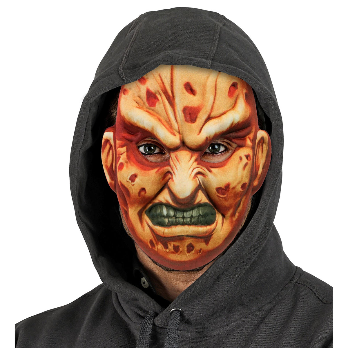 A person modeling a 100% EVA Freddy slasher mask featuring sinister raised teeth and burn details, worn casually underneath a black hoodie.