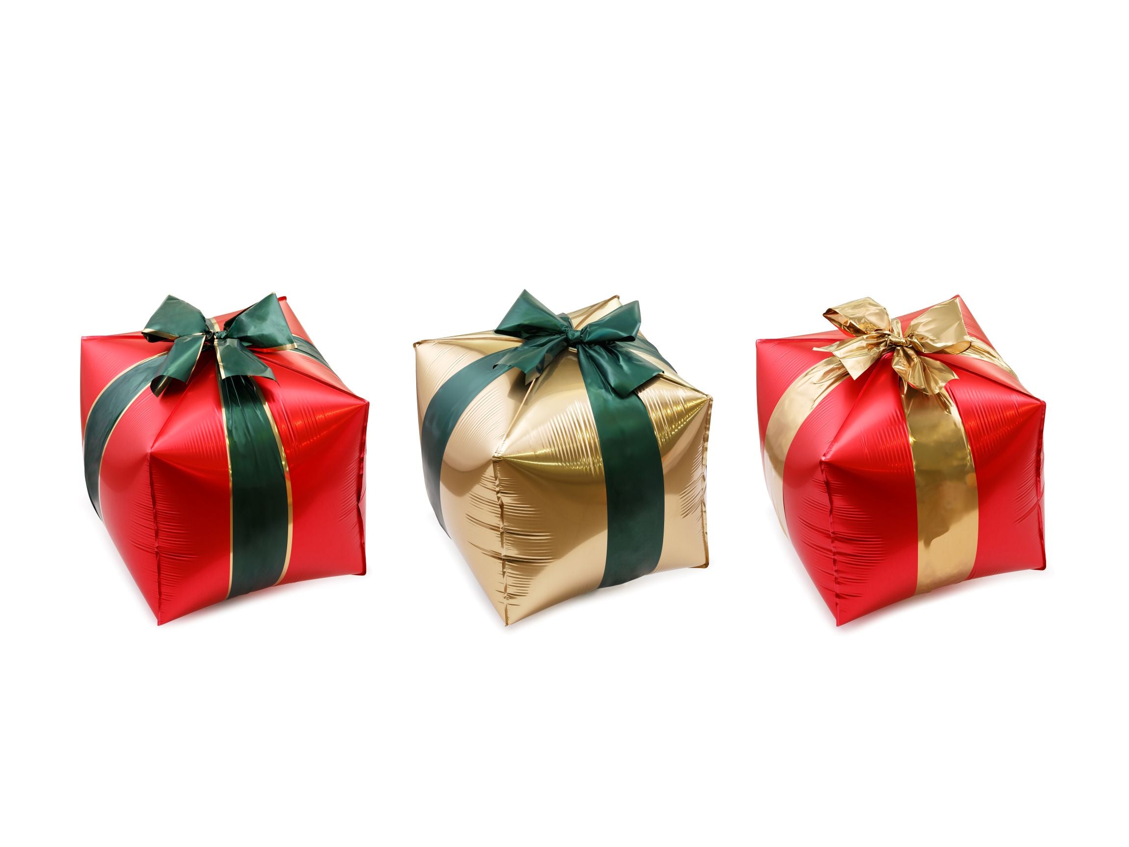 A set of three cube-shaped foil balloons designed to look like Christmas presents in red, gold, and green.