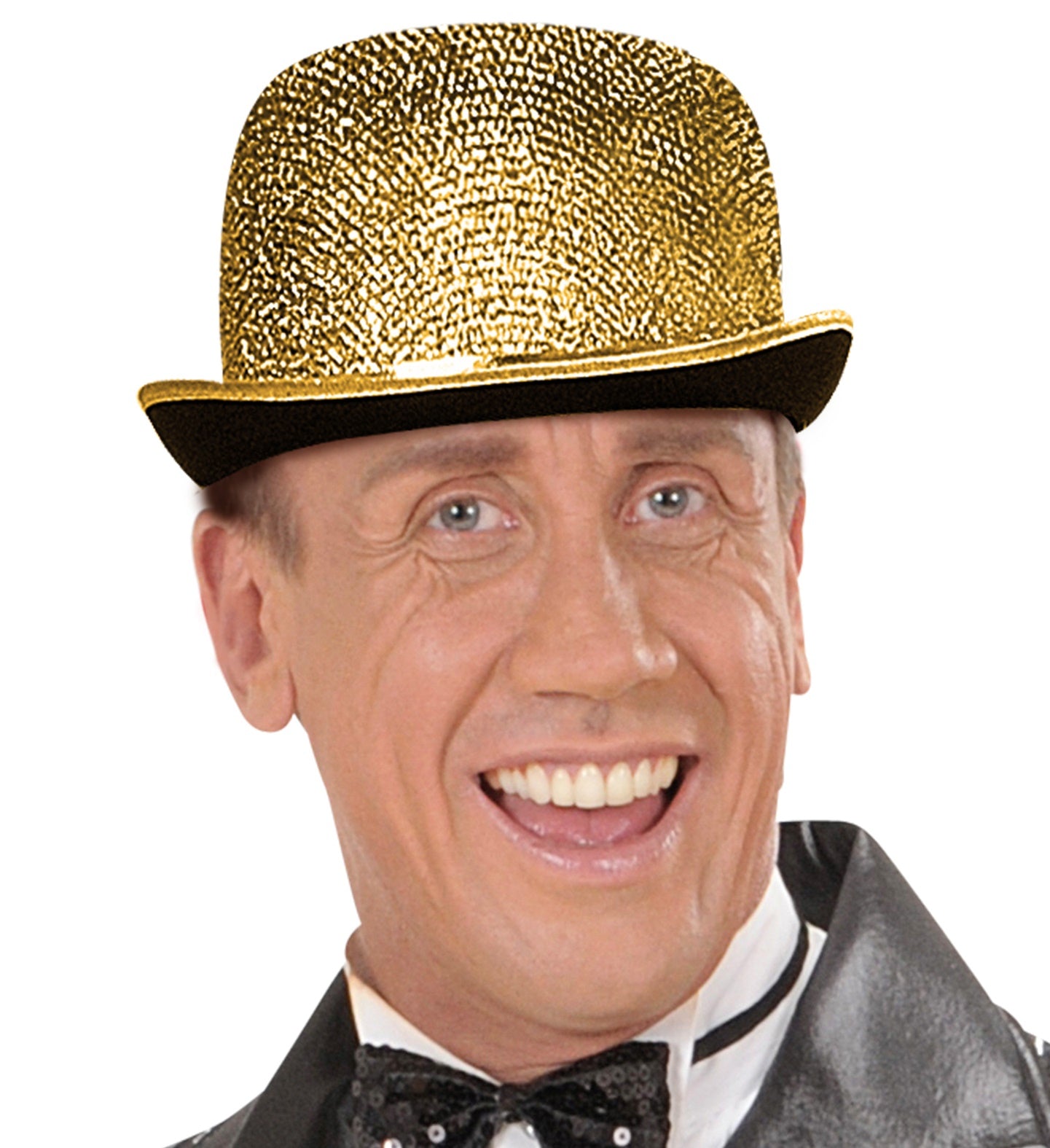 A close-up of a smiling man wearing a gold glittery felt bowler hat and a black sequin bow tie, against a white background.