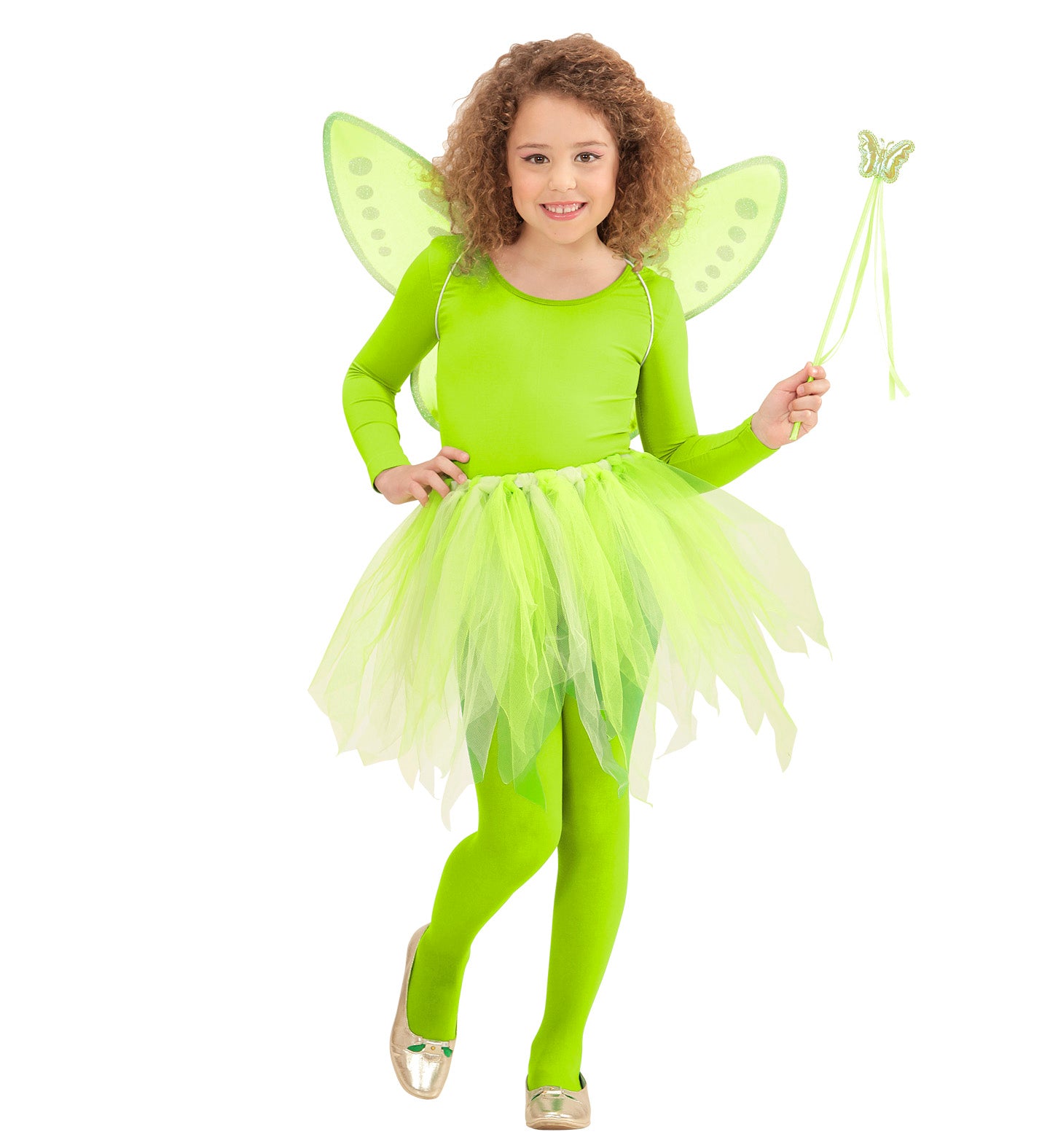 A smiling model dressed as a woodland fairy, wearing a bright green layered tulle tutu, matching glittery green fairy wings, and playfully holding a green butterfly magic wand with ribbons.