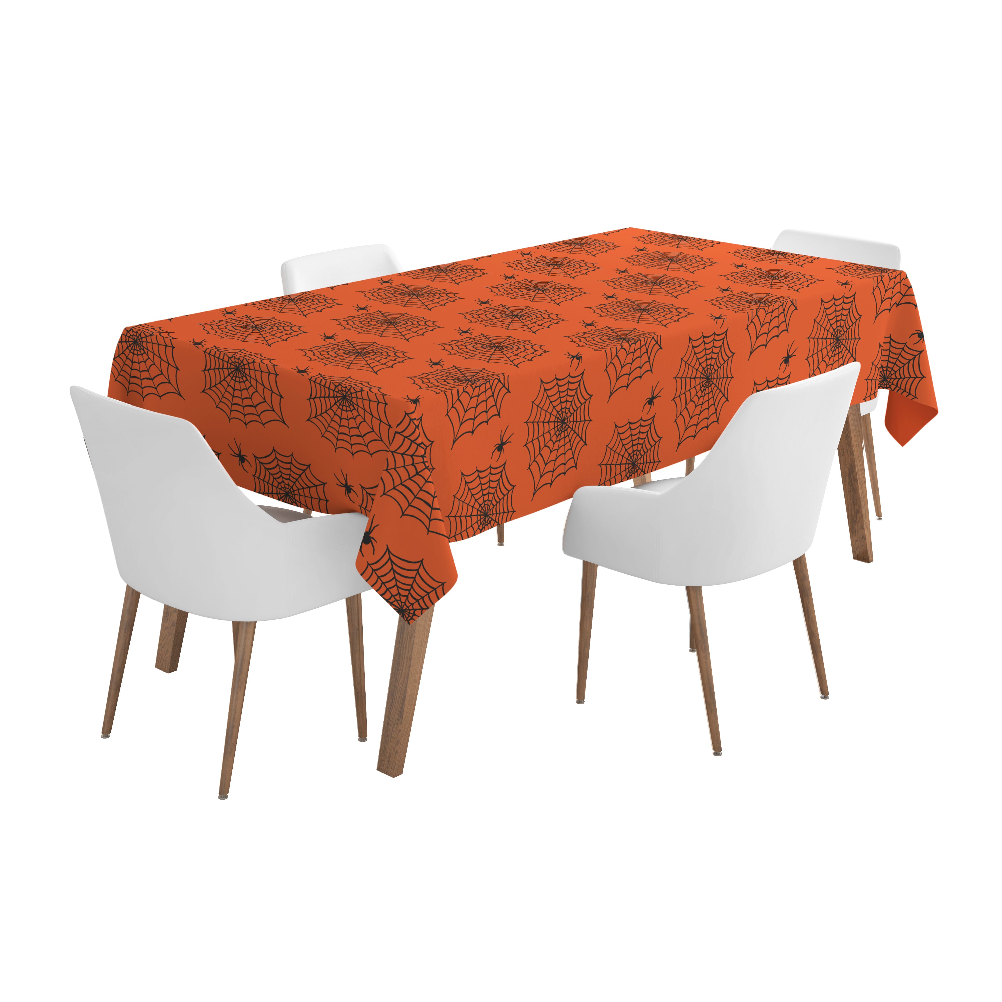 A rectangular dining table with four white chairs, covered with an orange tablecloth decorated with a repeating black spiderweb and spider pattern.