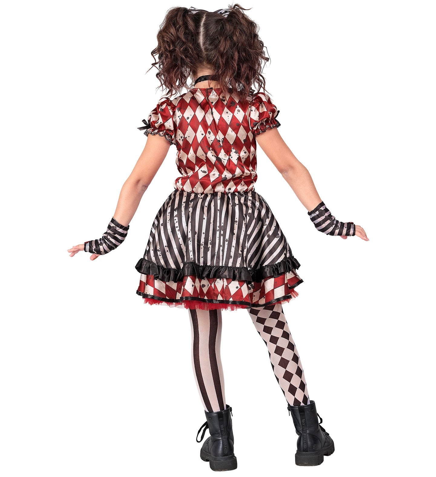 A child from the back, posing in a Harlequin Doll Clown costume, showing the mixed diamond and striped patterns of the dress, the ruffles, black and white patterned tights, and matching glovelettes, against a white background.