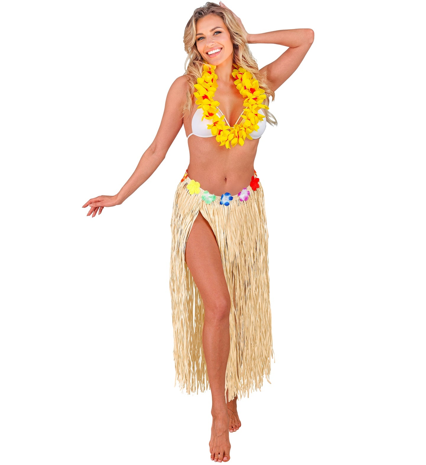 A smiling woman wearing a white bikini top, a yellow lei, and a long, natural-colored Hawaiian hula skirt with a colorful flower waist, striking a pose against a white background.