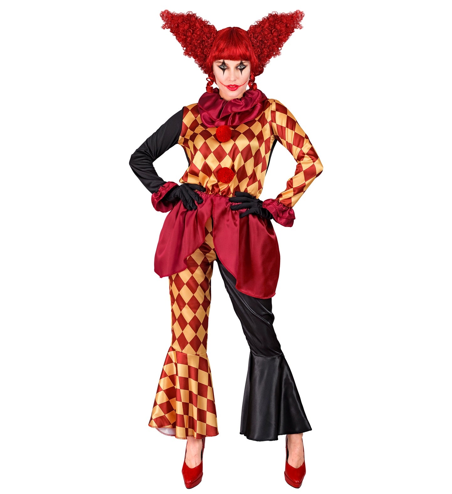 A woman in a colorful but creepy clown costume, consisting of a ruffled neck collar, a coat with one black sleeve and one harlequin-patterned sleeve, and a pair of mismatched pants with one leg in a harlequin pattern and the other in black, flared at the bottom. The person is wearing a wild, curly red wig and has clown makeup on their face.