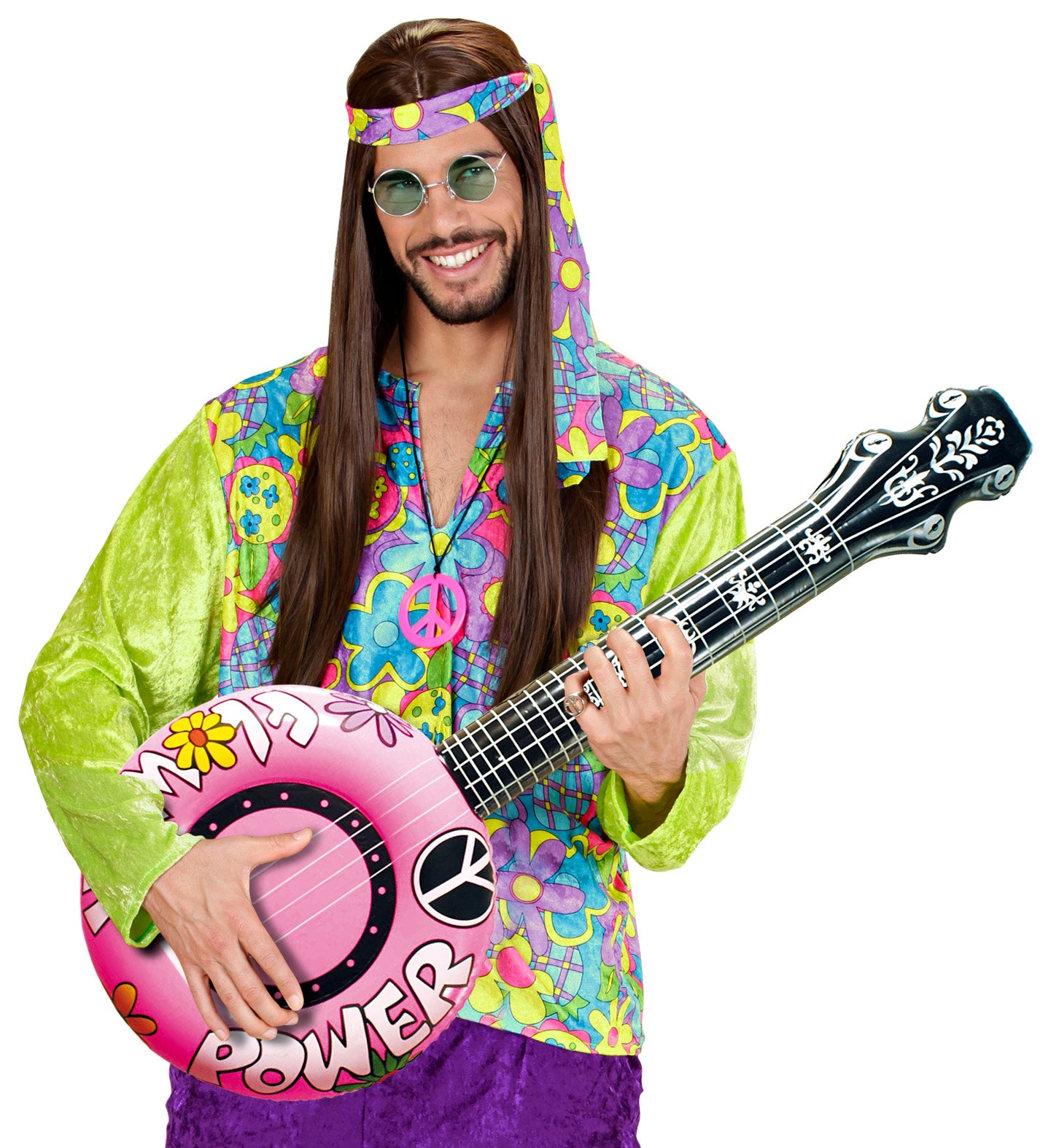 Man in a colorful 60s hippie costume smiling and holding an inflatable pink flower power banjo.
