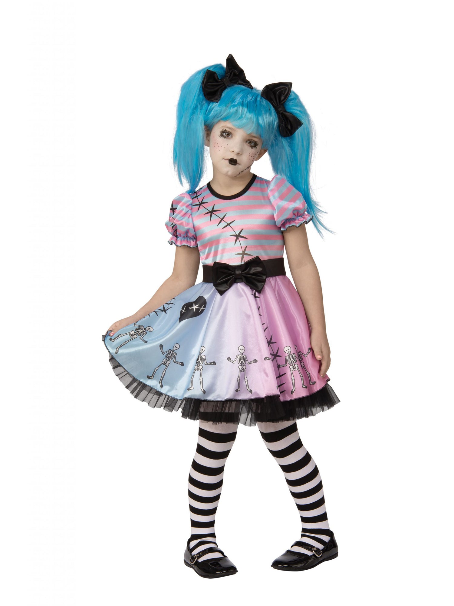 Girl wearing a Little Blue Skelly Costume, featuring a pink and blue ombré skater dress with skeleton print, puff sleeves, black and white striped tights, and a blue wig with black bows.