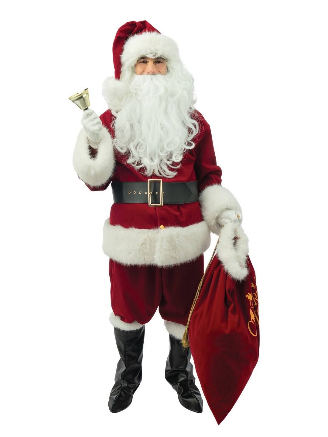 A man in a full professional luxury Santa Claus suit, holding a bell and a red sack.