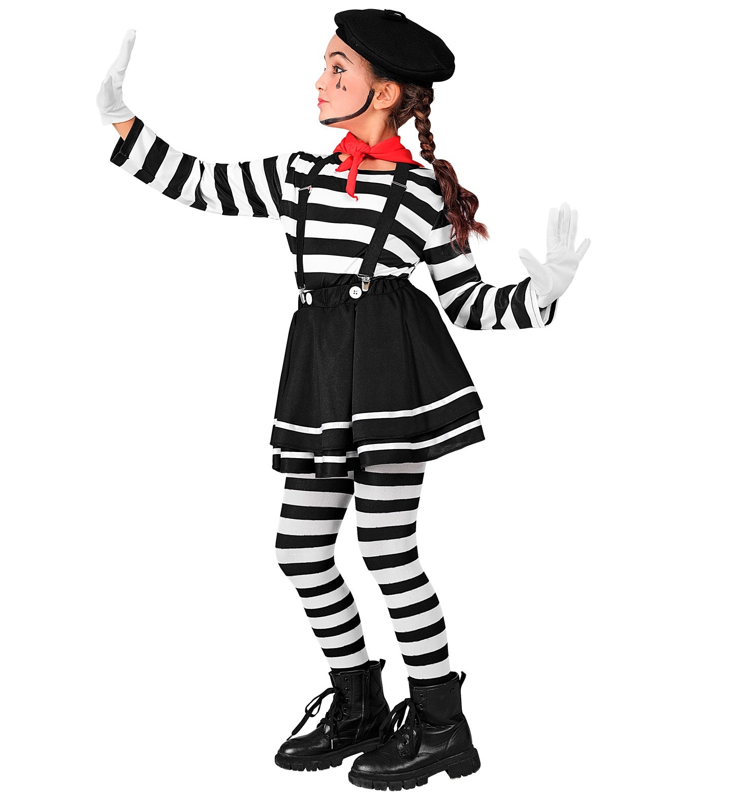 A child in a mime costume, viewed from the side, striking a pose with arms raised. The costume includes a black beret, white face paint with black tear drops, a red neckscarf, a black and white striped long-sleeve shirt, a black skirt with white trim, black suspenders, black and white striped leggings, white gloves, and black boots.
