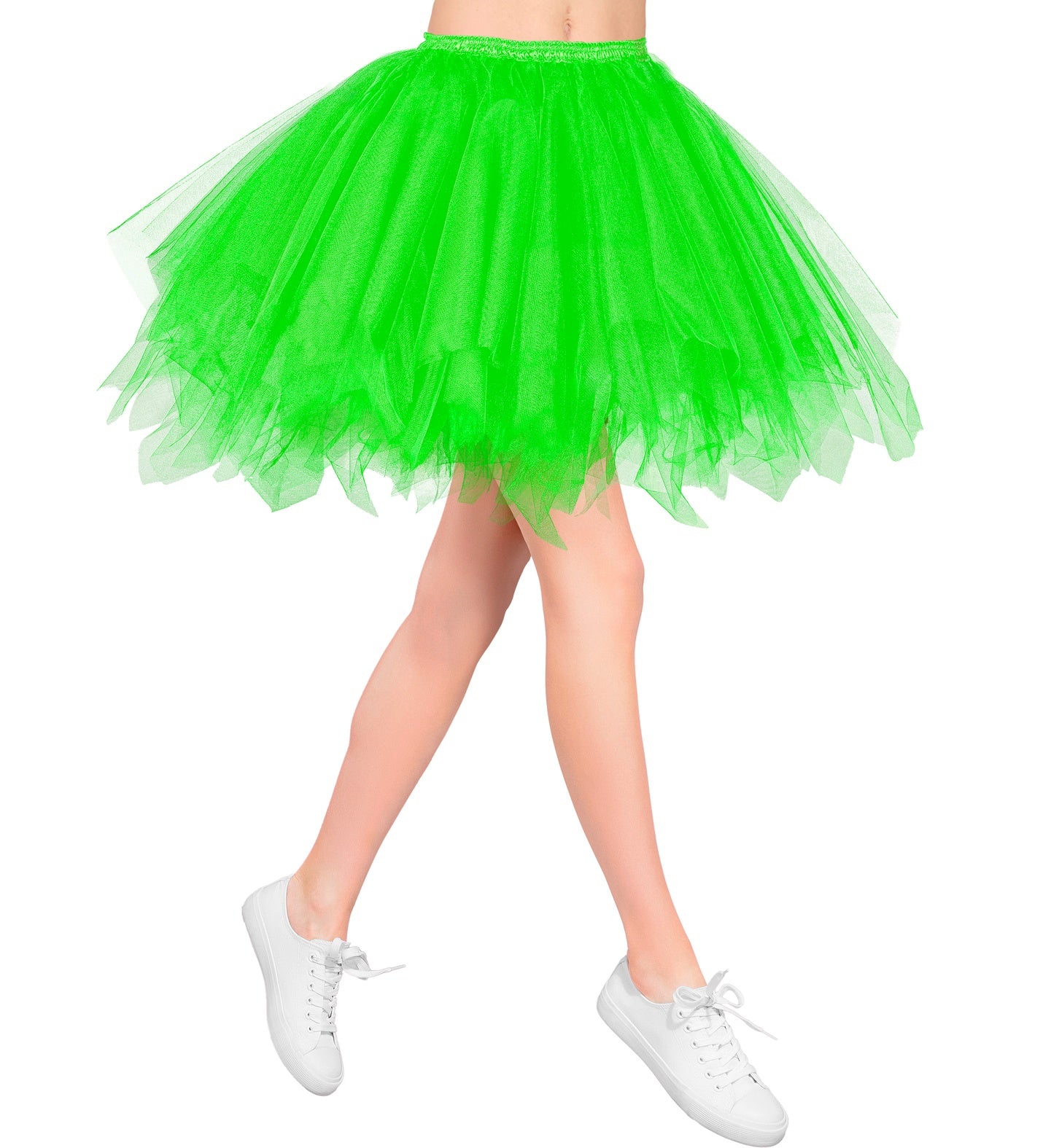 Woman's legs wearing a short, fluffy neon green tutu skirt with white trainers.