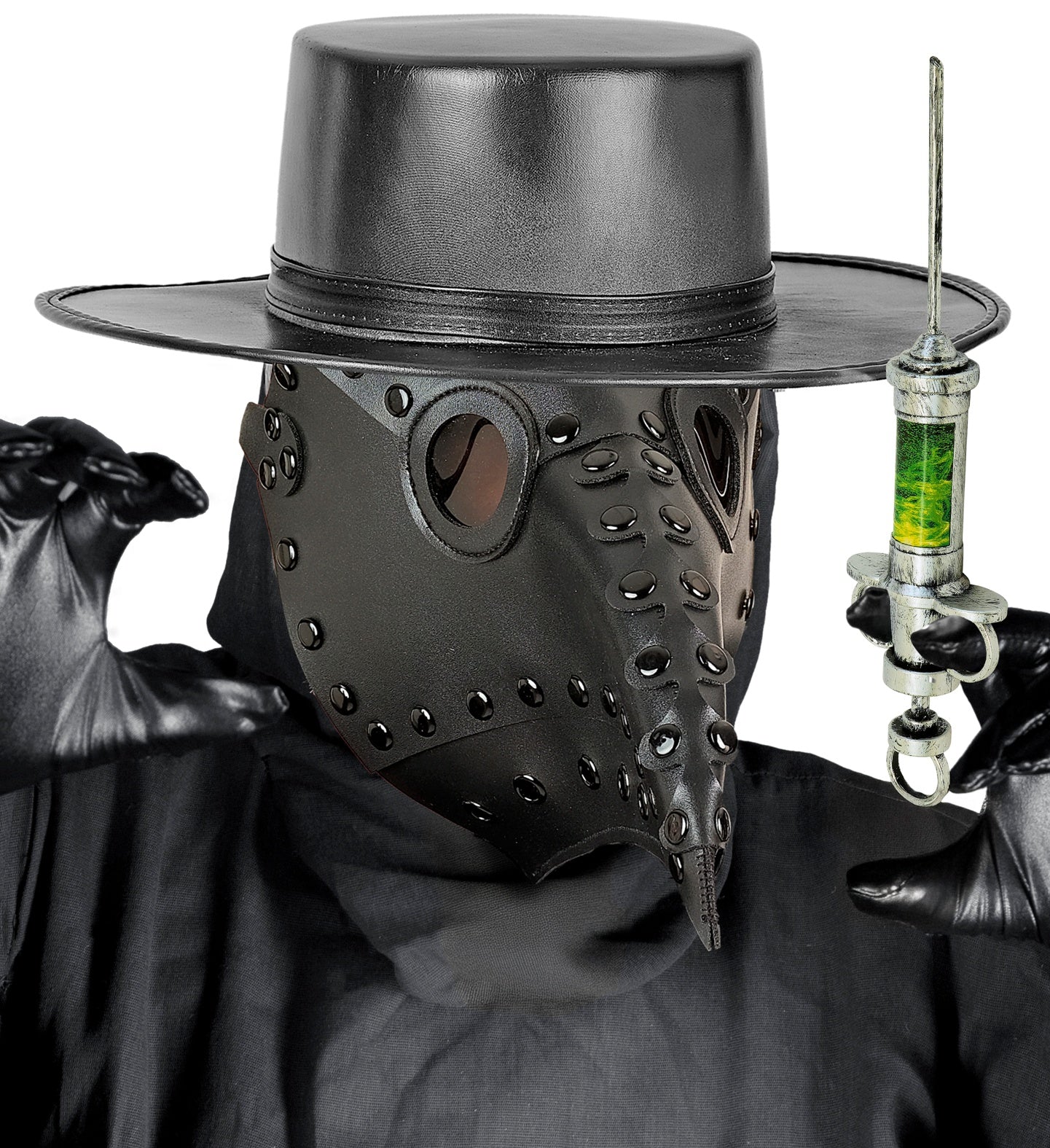 A model wearing a gothic black plague doctor mask and leather hat, wearing black gloves and holding up a vintage-style silver syringe prop filled with green liquid.