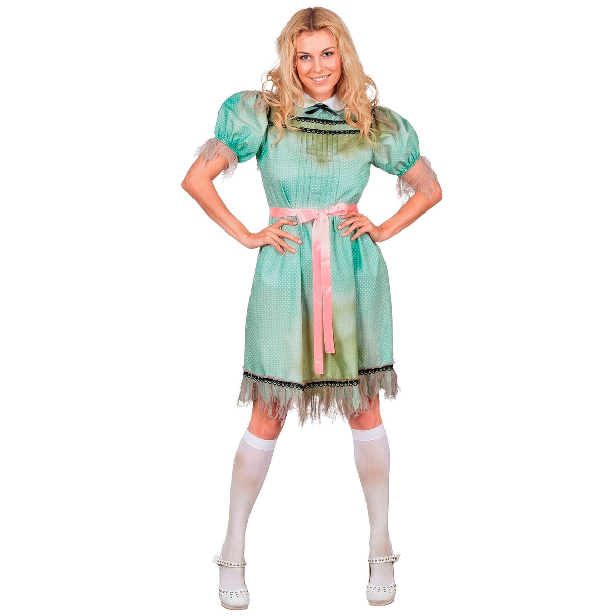 A smiling blonde woman modeling a mint green polka-dot possessed nightgown costume with frayed sleeves and hem, paired with a pink satin belt and knee-high socks.