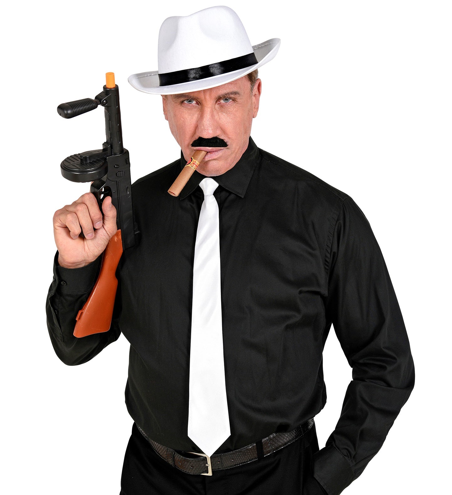 A man dressed as a 1920s mobster wearing a black shirt, white tie, and white fedora, holding a prop Tommy gun and a cigar while showing off a black moustache.