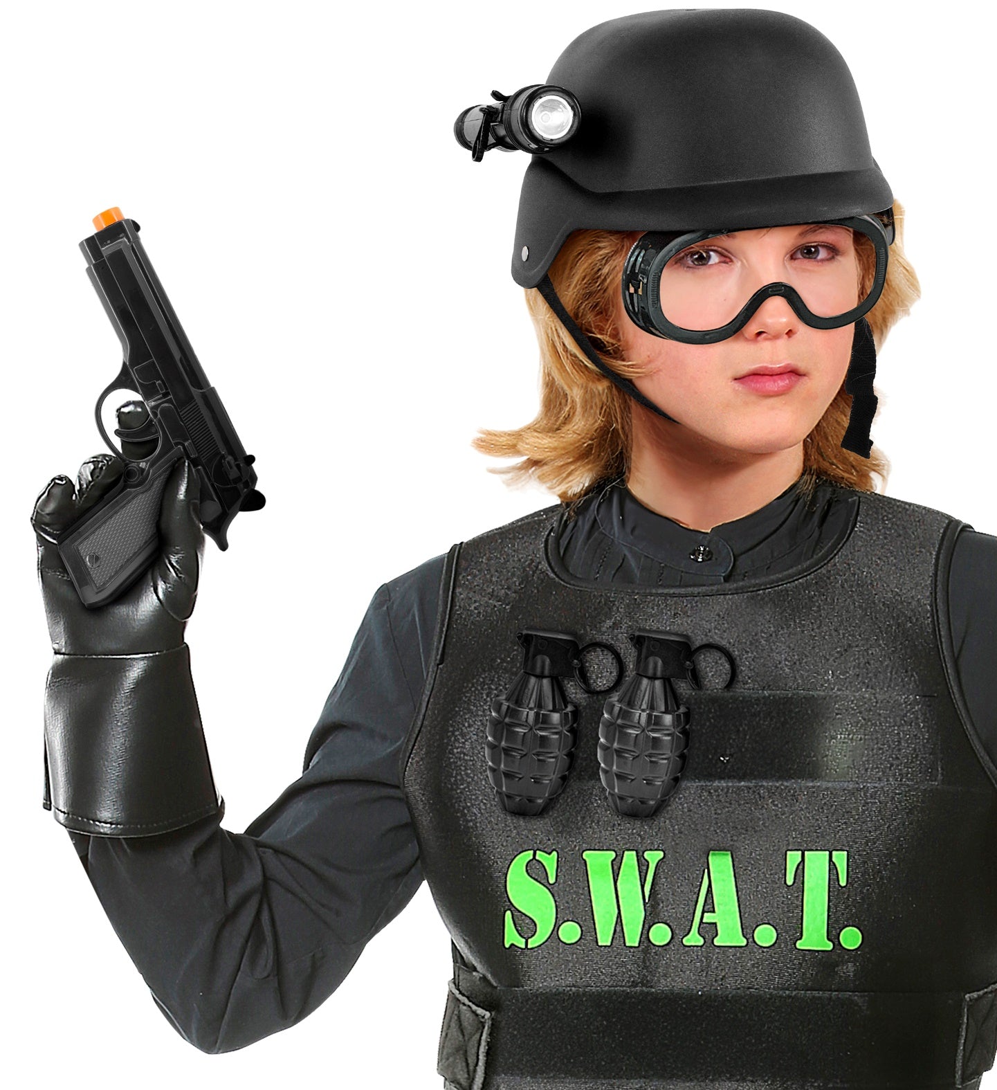 A child wearing a black SWAT police costume including a black helmet with an attached flashlight, black tactical goggles, a black vest with two toy grenades attached to the chest, and black gloves, holding a black toy pistol with an orange tip.
