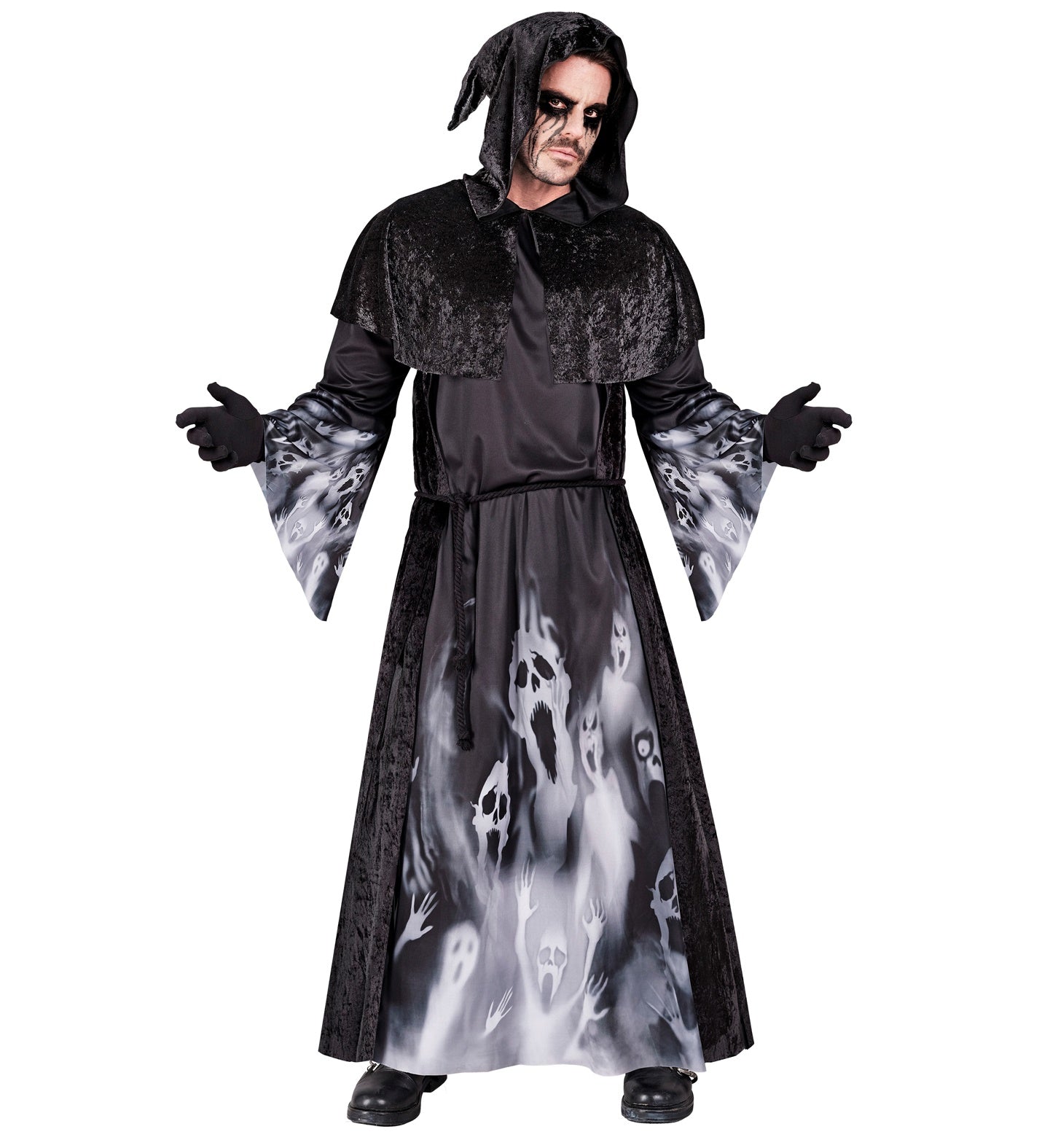 A man in a black, hooded robe with a white print of screaming ghostly faces, with a capelet and rope belt, posing with arms outstretched.