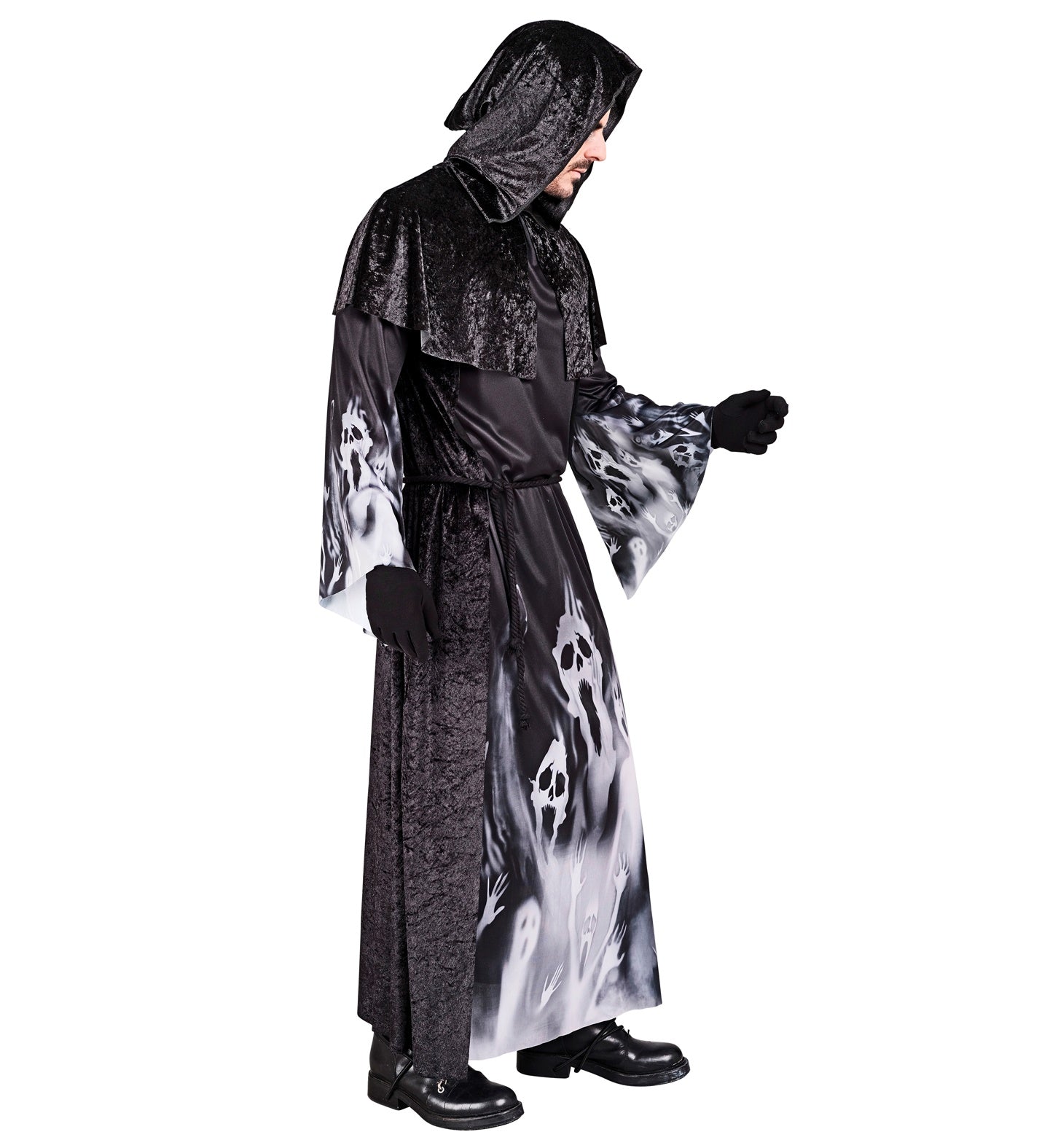 A side profile of a person in the black, hooded robe with a ghostly face print, with one arm outstretched.