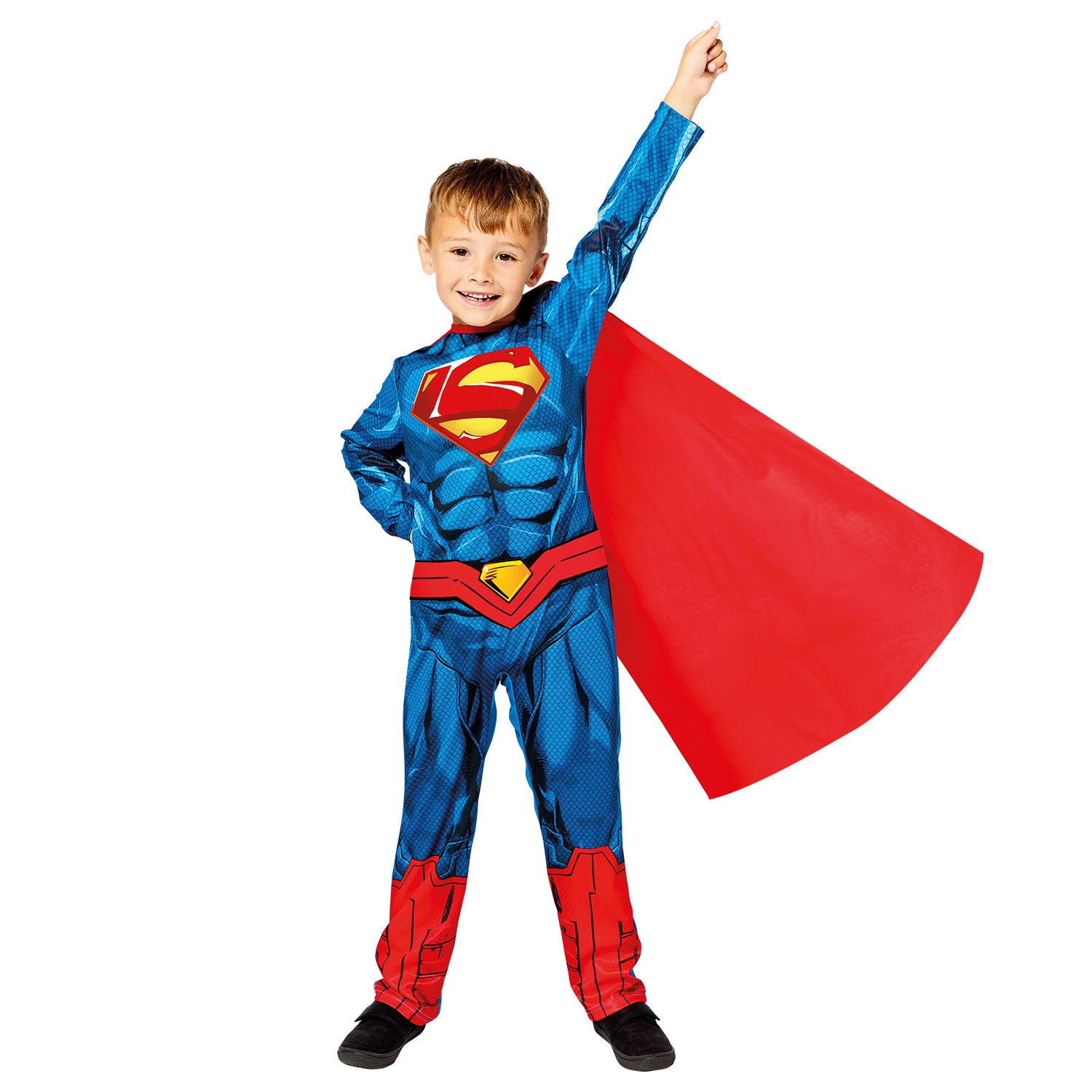 A happy child in a full Superman costume with a red cape, posing with one arm raised in a flying pose.