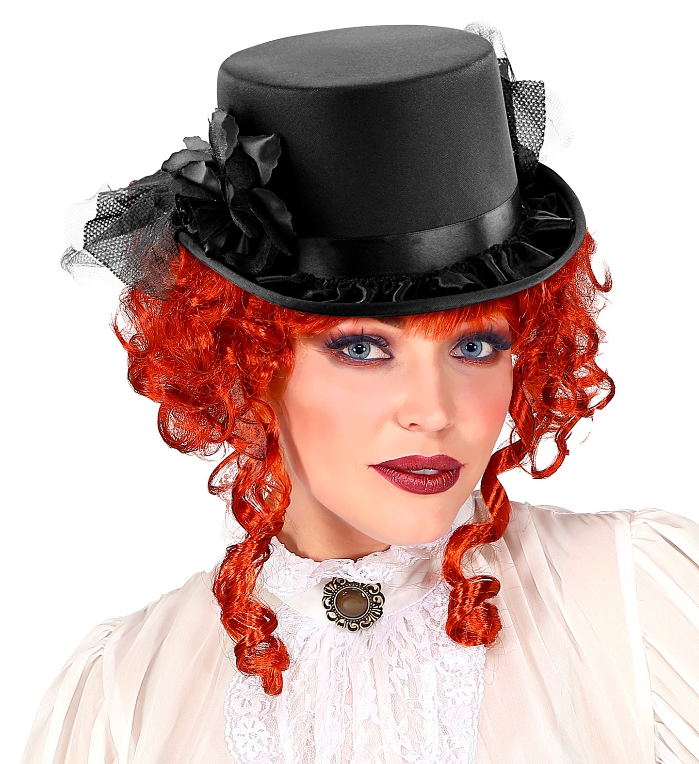 A woman with a red curly wig wearing a Victorian-style mini top hat with a black rose and net veil.
