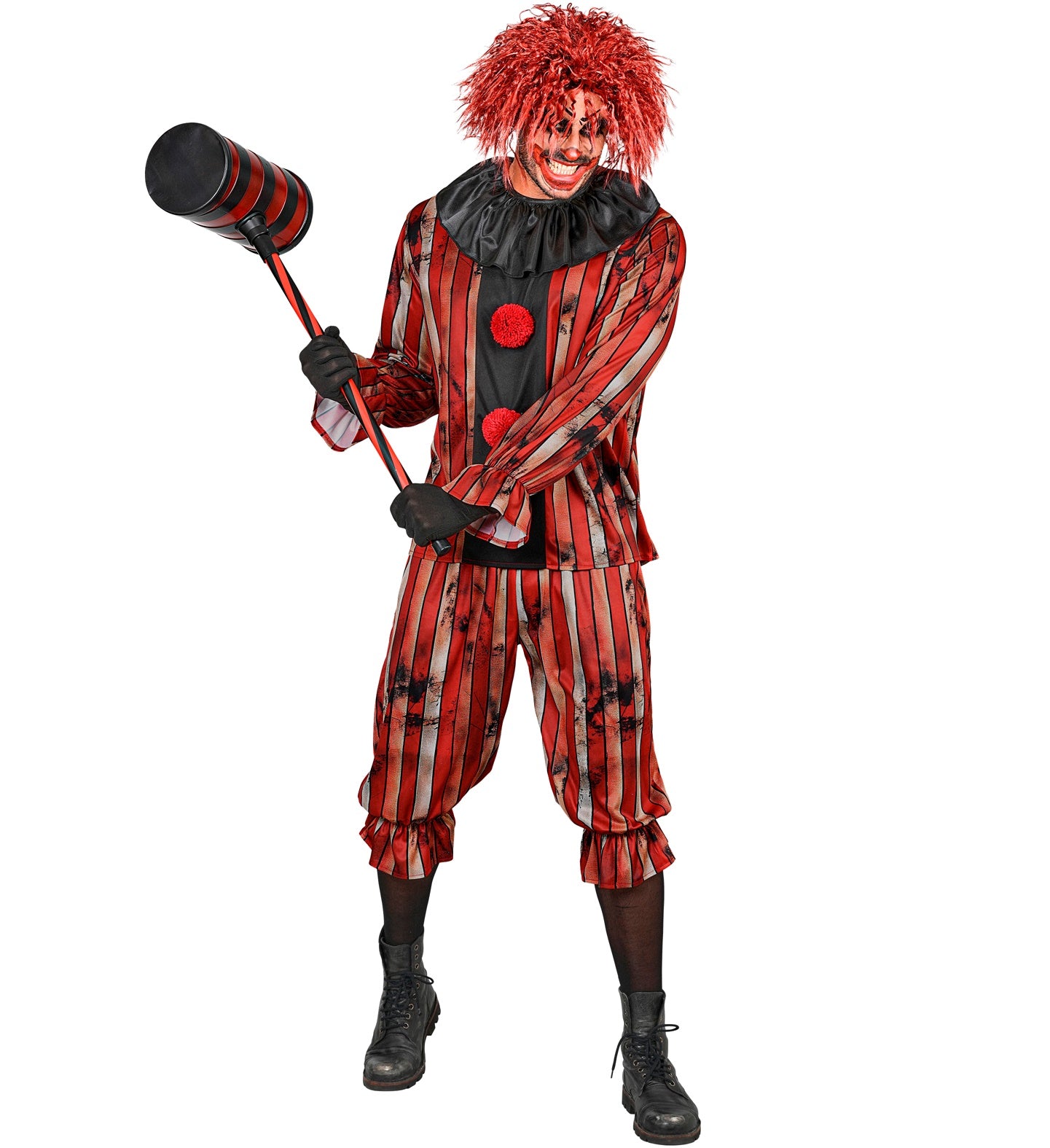 A male model posing playfully as a creepy circus clown, holding a giant toy carnival hammer, wearing a vintage-style red and black distressed striped coat with a black neck ruff, and matching cropped puffed pants.