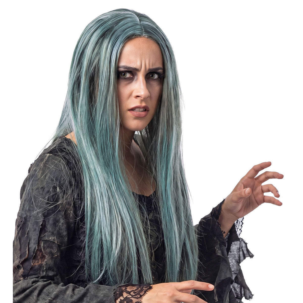 A woman modeling a long, straight teal and silver-grey witch wig, wearing a distressed dark grey Halloween dress and reaching out with a spooky claw hand.