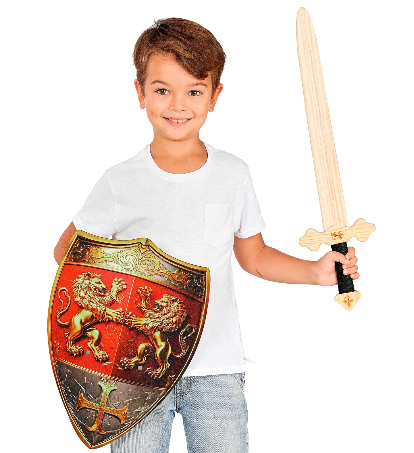 A smiling model in a white t-shirt holding a wooden toy sword and a medieval wooden Lionheart shield with a detailed crest.