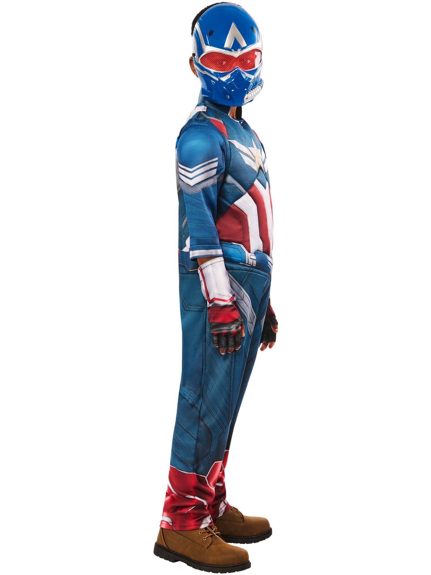 A side profile of a child in a Captain America deluxe costume, showing the blue jumpsuit with red and white armor details, a blue half-mask with red goggles, and fingerless gloves.