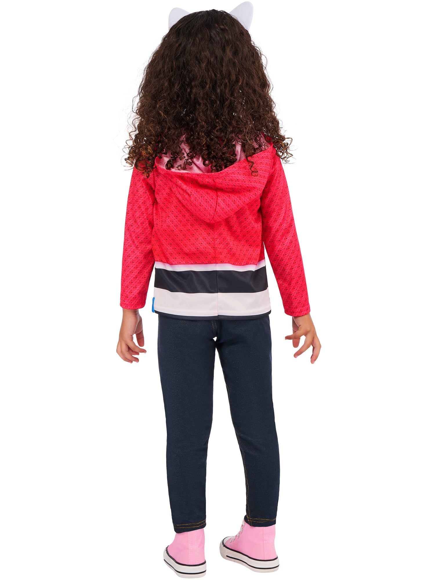 The back view of a child wearing the Gabby's Dollhouse fancy dress costume, showing the back of the bright pink printed jacket and striped top.