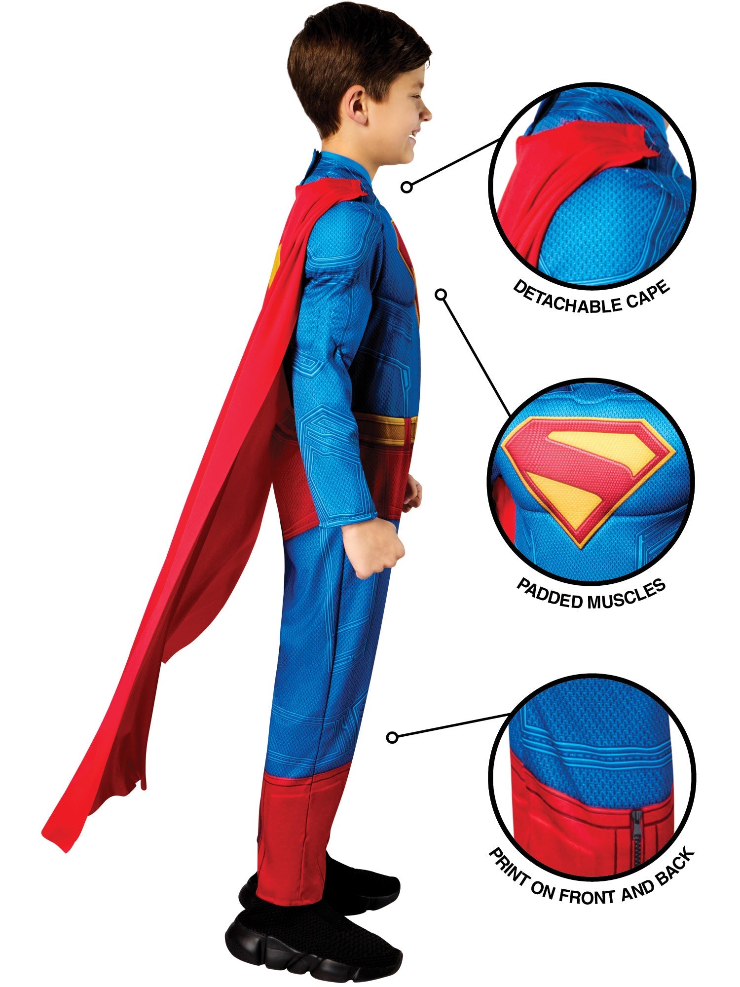 A side profile of a child in a Superman costume, with callouts pointing to the detachable cape, padded muscles, and the printed details on the front and back of the suit.