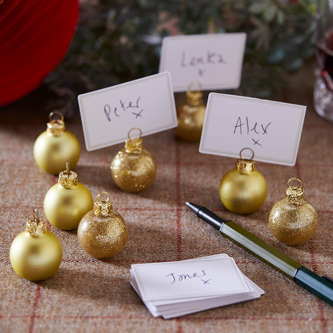 Botanical Nutcracker gold bauble Placecard Holders