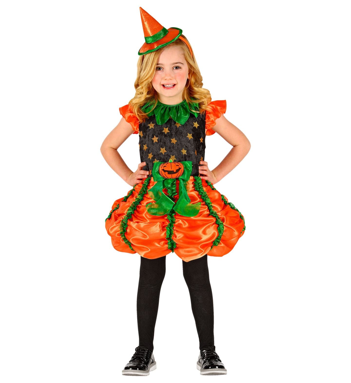 A child wearing a Pumpkin Witch costume which includes a short-sleeved dress with black panel with stars and pumpkin designs, green at the neck and bottom, and a witch's hat.