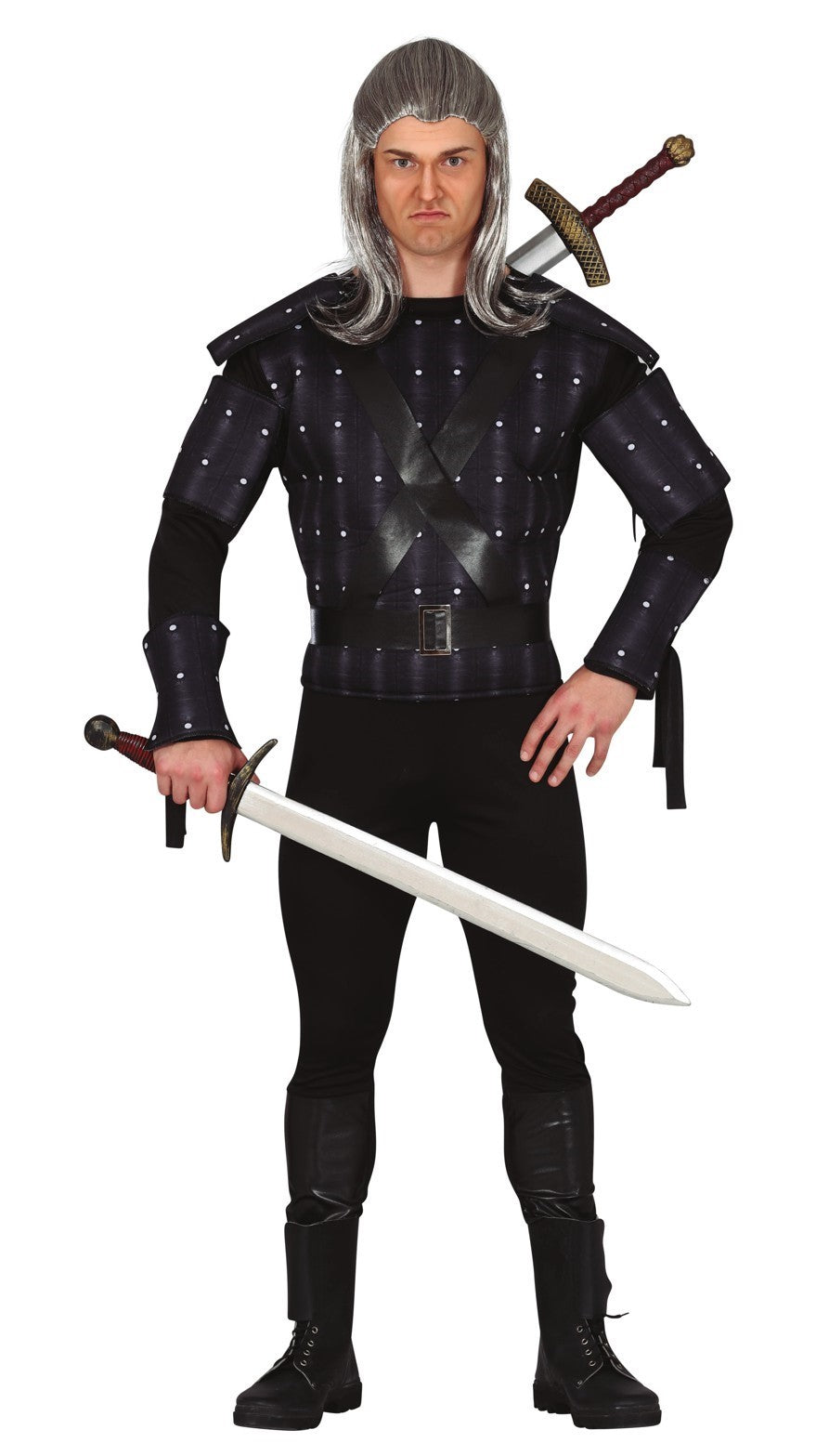 Man wearing a Men's Geralt of Rivia Witcher Hunter costume, featuring a black padded armor-like top, black long-sleeved shirt, black trousers, black boots, and a long grey wig, holding a sword.