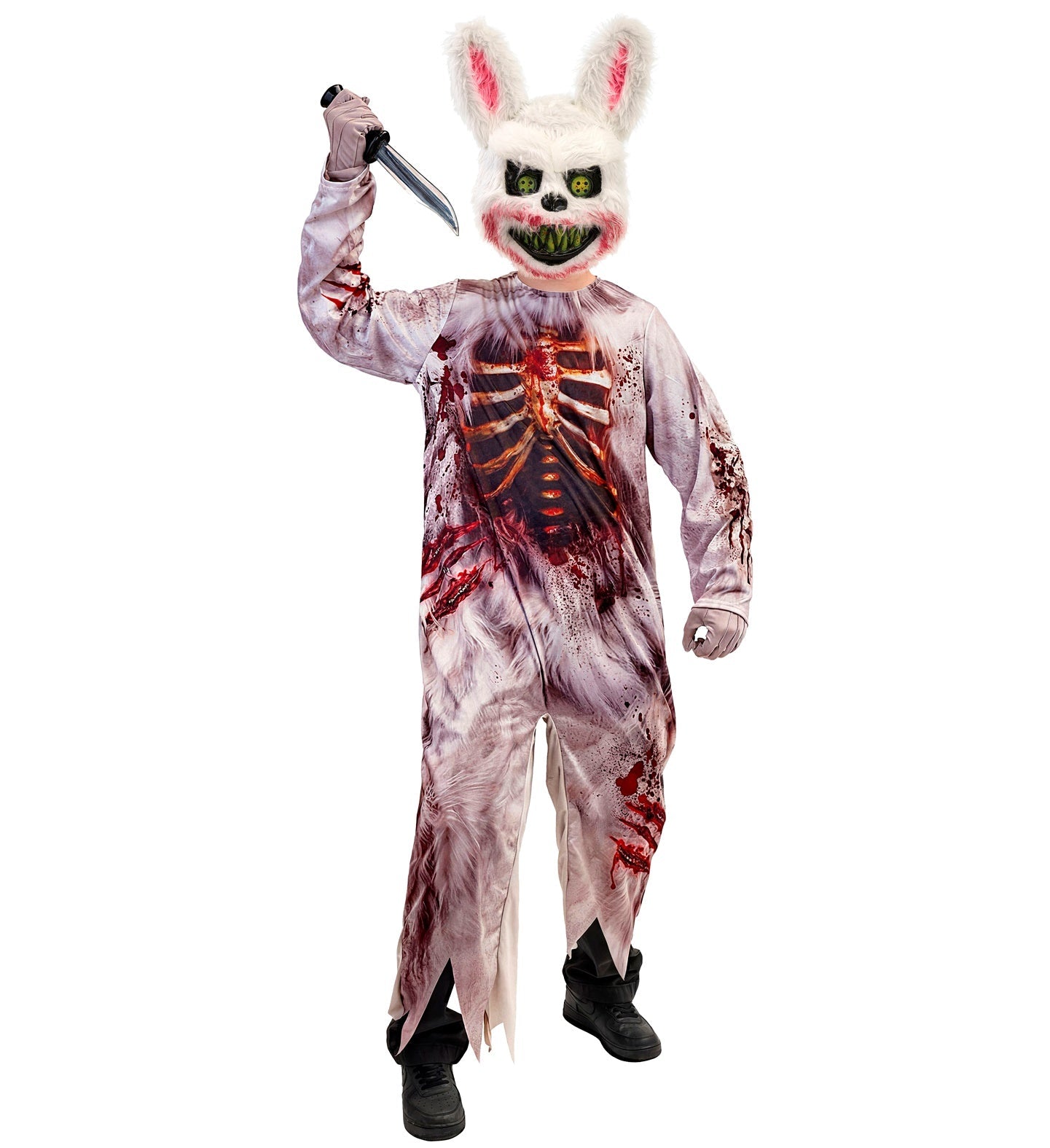A full-length shot of a child standing in a kids' zombie rabbit Halloween costume with a furry monster mask and an exposed-bone printed jumpsuit.