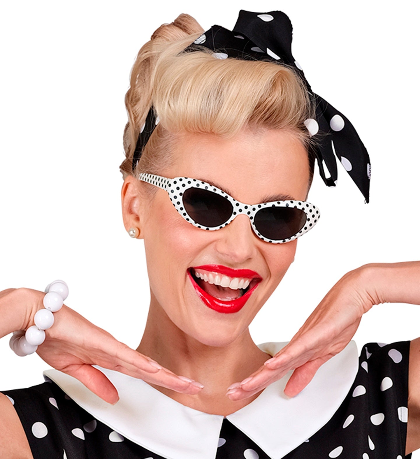 Model smiling in vintage cat-eye sunglasses with a classic pin-up hairstyle and red lipstick.