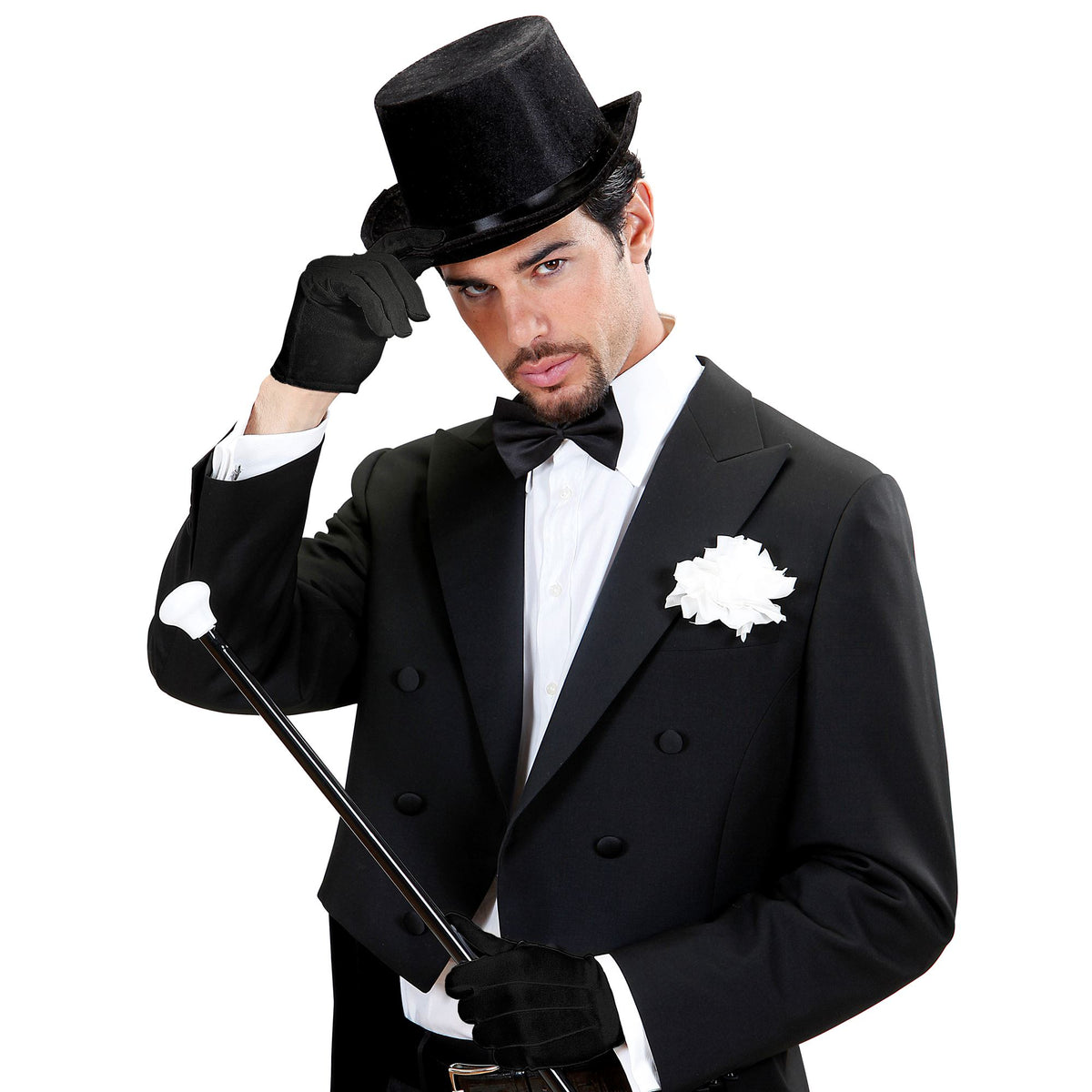 A suave man in a classic black tuxedo, white shirt, and black bowtie tipping his black top hat while wearing elegant short black costume gloves.