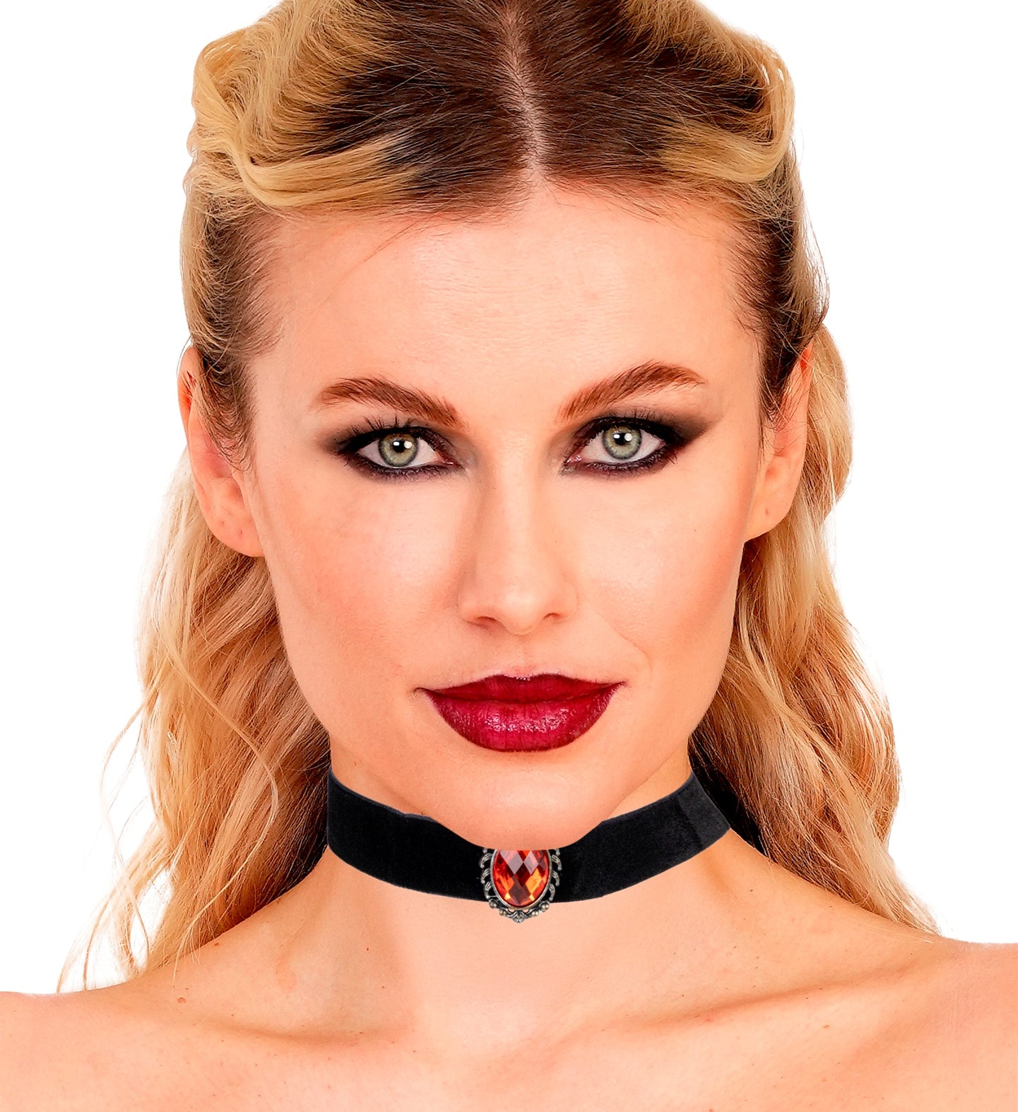 A close-up of a woman with blonde hair and dark eye makeup modeling the black velvet choker necklace with the red stone gem.
