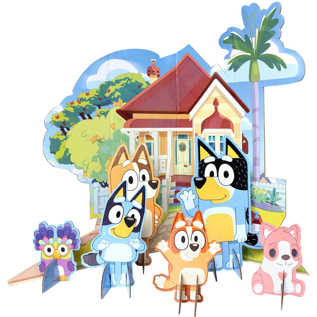 The complete 7-piece Bluey Theme Table Decoration Kit arranged on a white background, featuring the Heeler house, Bandit, Chilli, Bluey, Bingo, Chattermax, and Floppy card cut-outs.